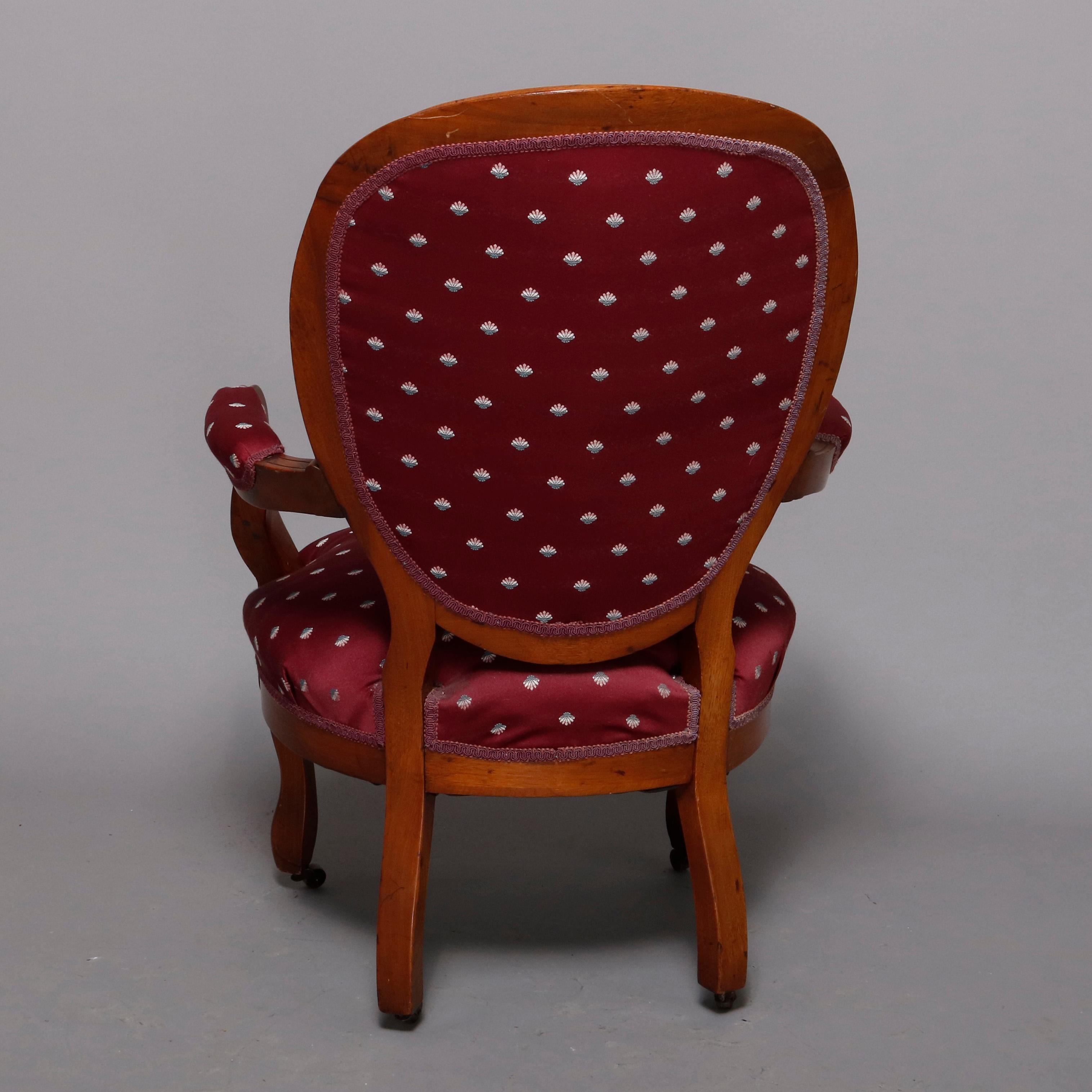 American Antique Victorian Upholstered Finger Carved Walnut Parlor Armchair, circa 1880