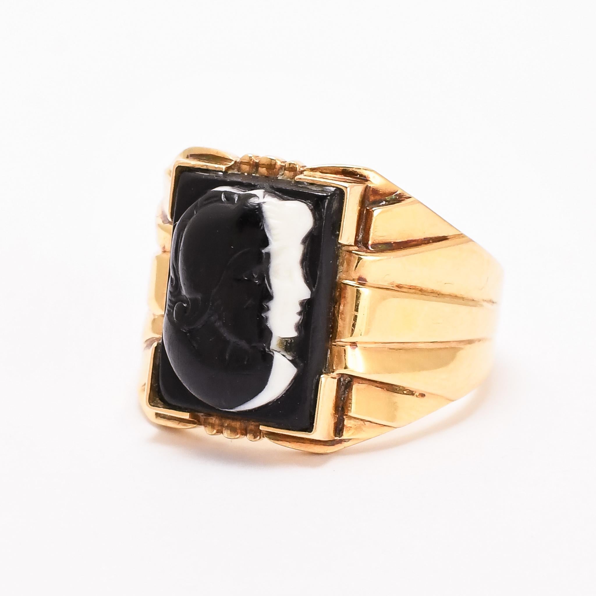 Love & War. A substantial antique signet ring set with an onyx cameo depicting Venus and Mars, both in profile facing to the right, the former rendered in white with Mars in black. The union between Mars and Venus was of particular importance to the