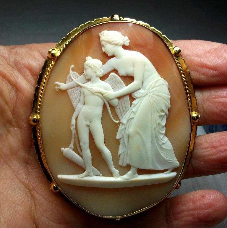 Women's or Men's Antique Victorian Venus Teaching Archery to Cupid Shell Cameo Brooch For Sale
