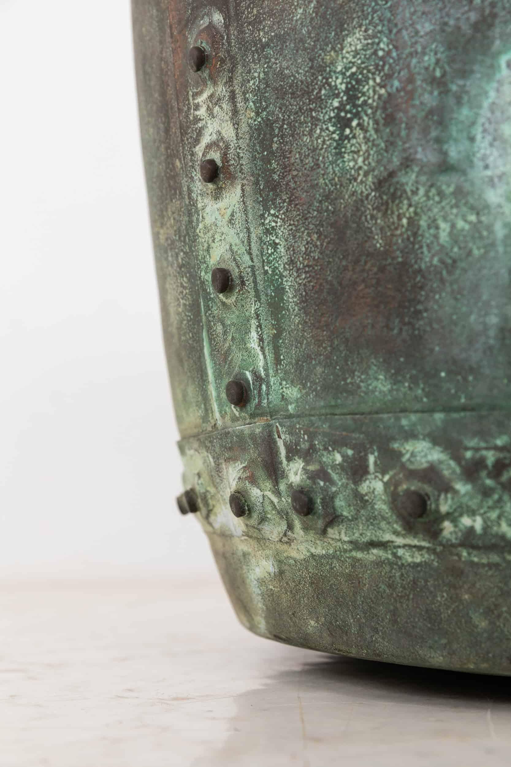 

A wonderful antique rivetted copper boiler pot. c.1880

Great size and shape with the most perfect natural verdigris patina that only time can produce with a substantial riveted repair. Ideal size for storing fireside logs or as a planter.

