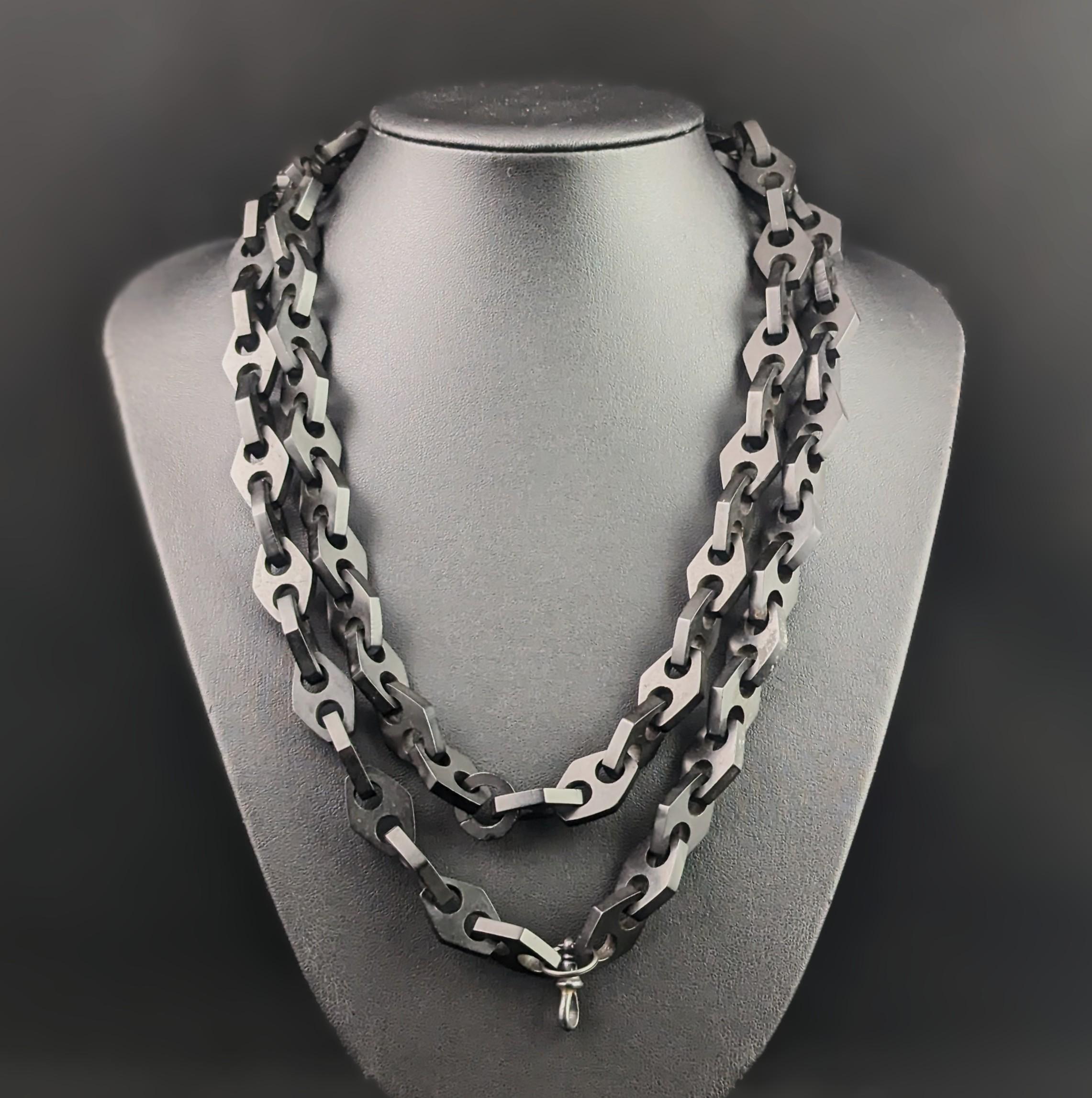 You can't fail to be enchanted by this beautiful, rare antique Victorian vulcanite longuard chain necklace.

It has chunky rounded diamond shaped links in rich inky black vulcanite, the necklace is an unusually long length for such a chunky piece,