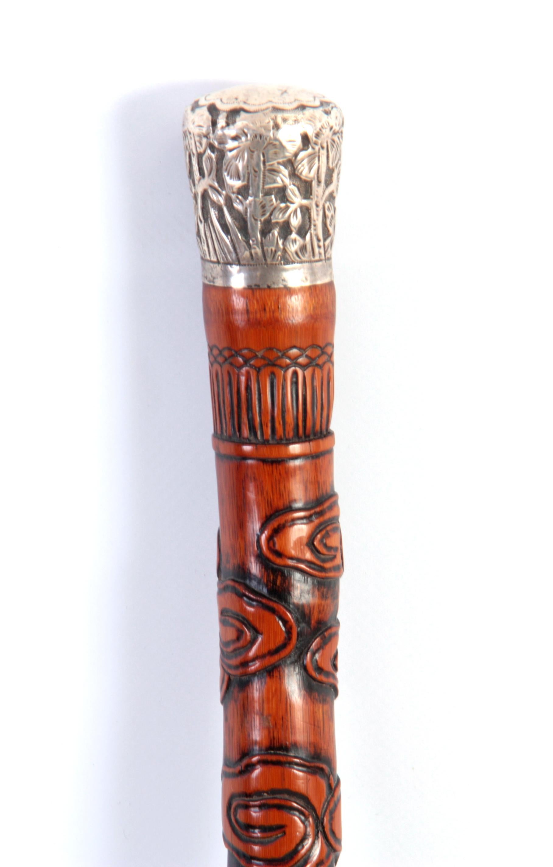 This is a superb Chinese sterling silver-mounted Malacca walking stick, circa 1880 in date.
 
This decorative walking cane features a splendid globular sterling silver pommel which is cast with exquisite leaf decoration.
 
The sturdy Malacca