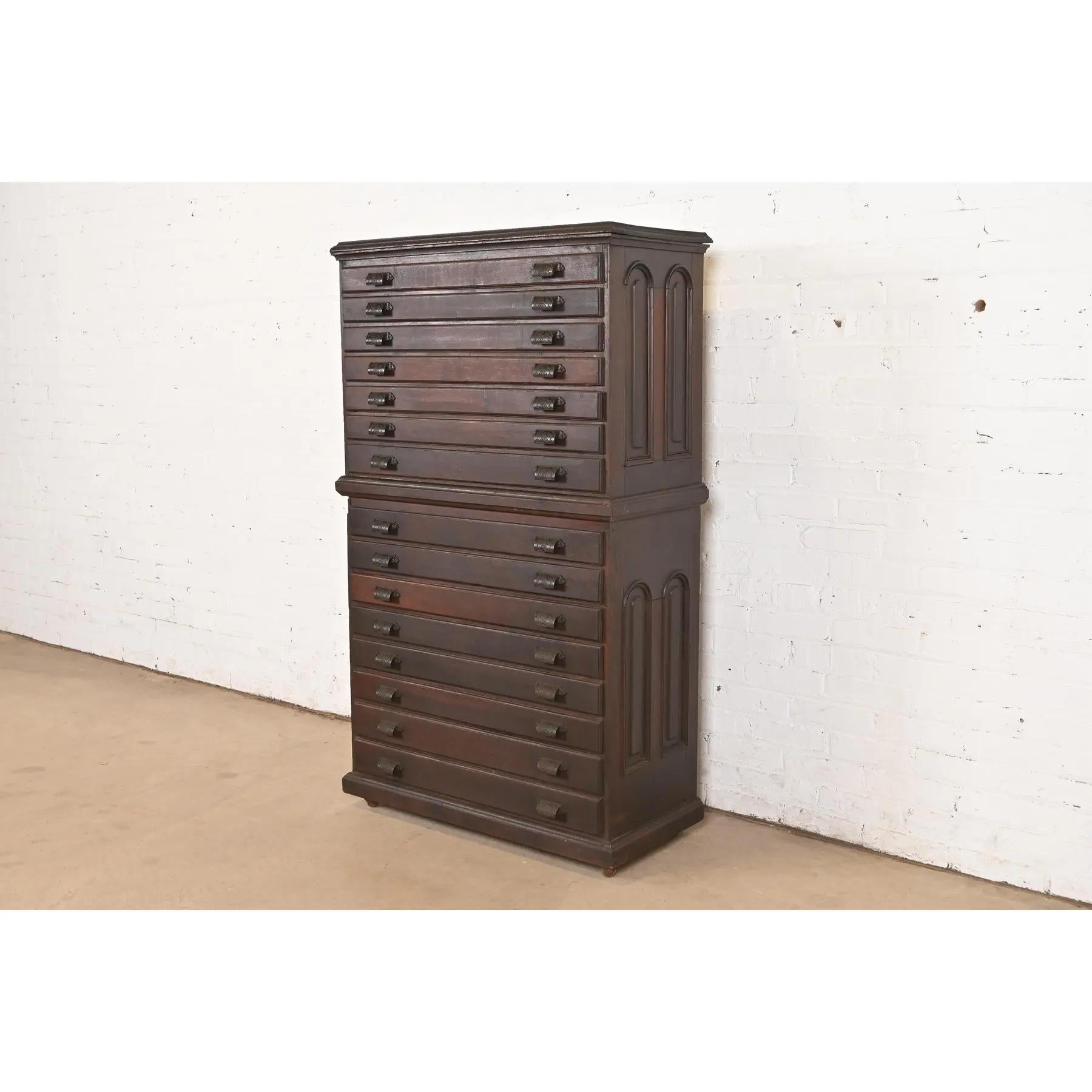 An exceptional antique Victorian or Arts & Crafts walnut fifteen-drawer architect's blueprint or map flat file cabinet or collector's cabinet

USA, Late 19th Century

Measures: 32.5