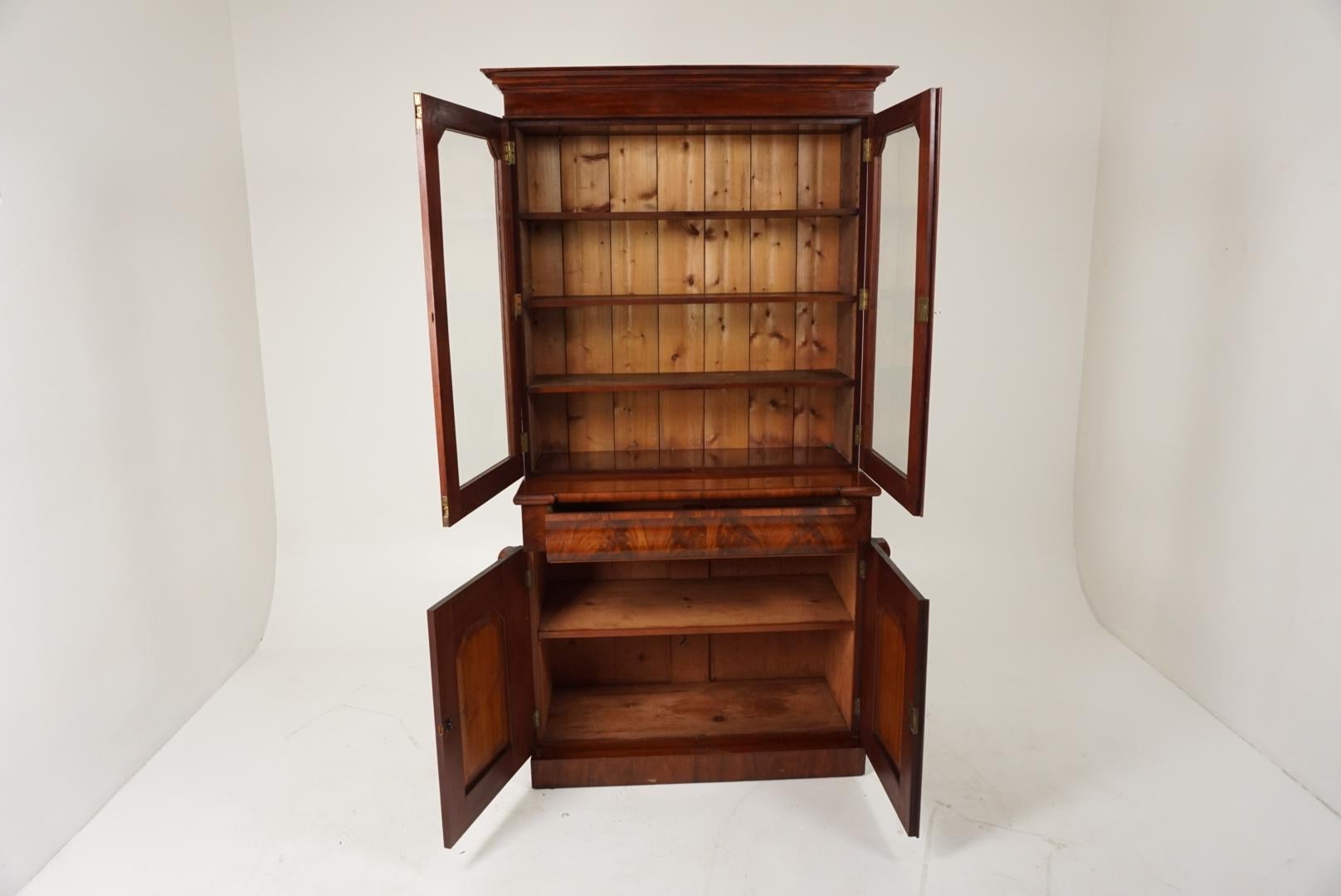 Antique Victorian walnut 4-door cabinet bookcase, Scotland 1875, B1837

Scotland, 1875
Solid walnut
Original finish
Flared cornice
Pair of glass doors with molding to the front
Opens to reveal three adjustable shelves
Base has single dove