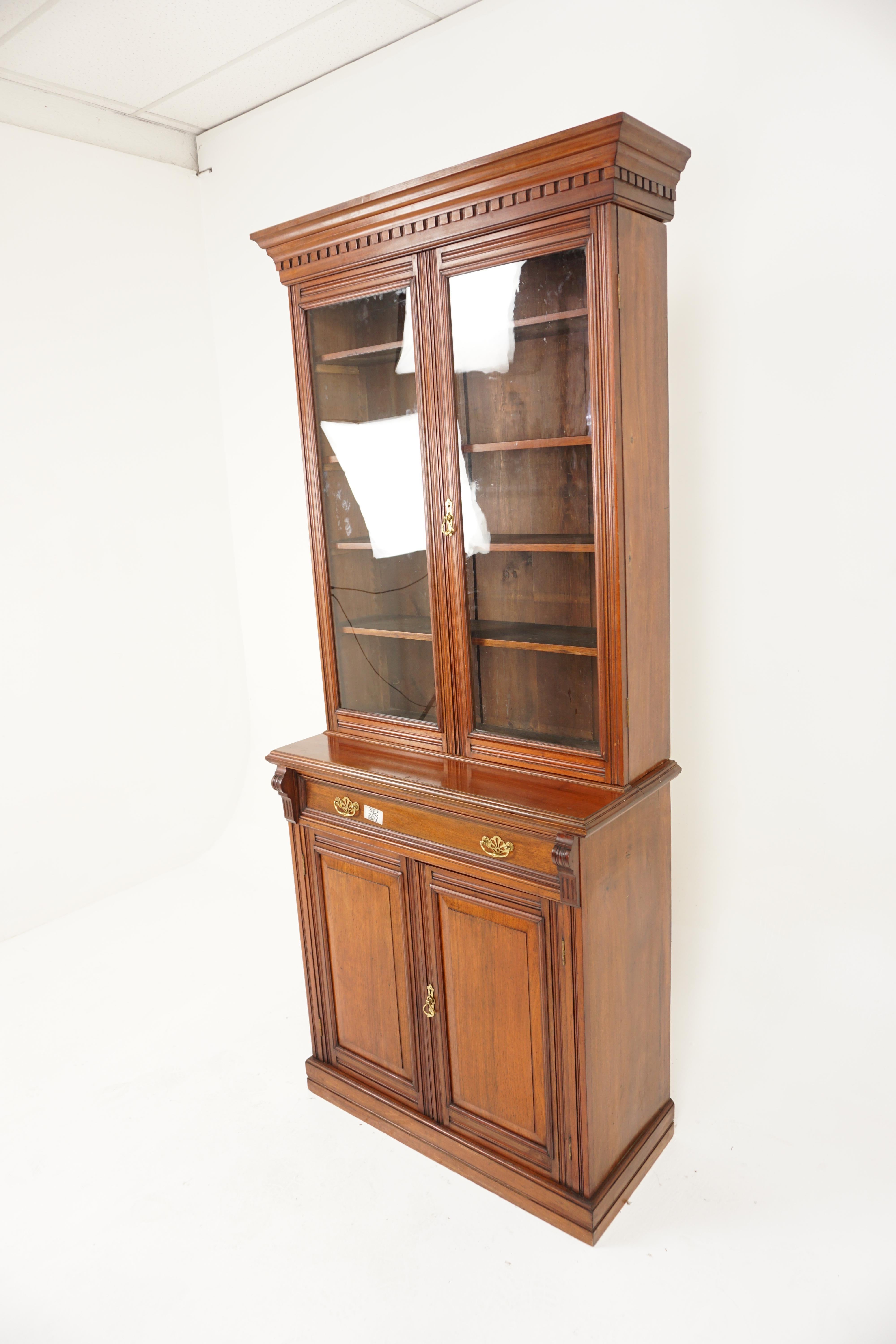 Antique Victorian Walnut 4 Door Glass Front Bookcase Display Cabinet, Scotland 1870, H990

Solid walnut
Original finish
Having a moulded cornice with a dentil frieze
Pair of original glass doors with four adjustable shelves
The base has a single