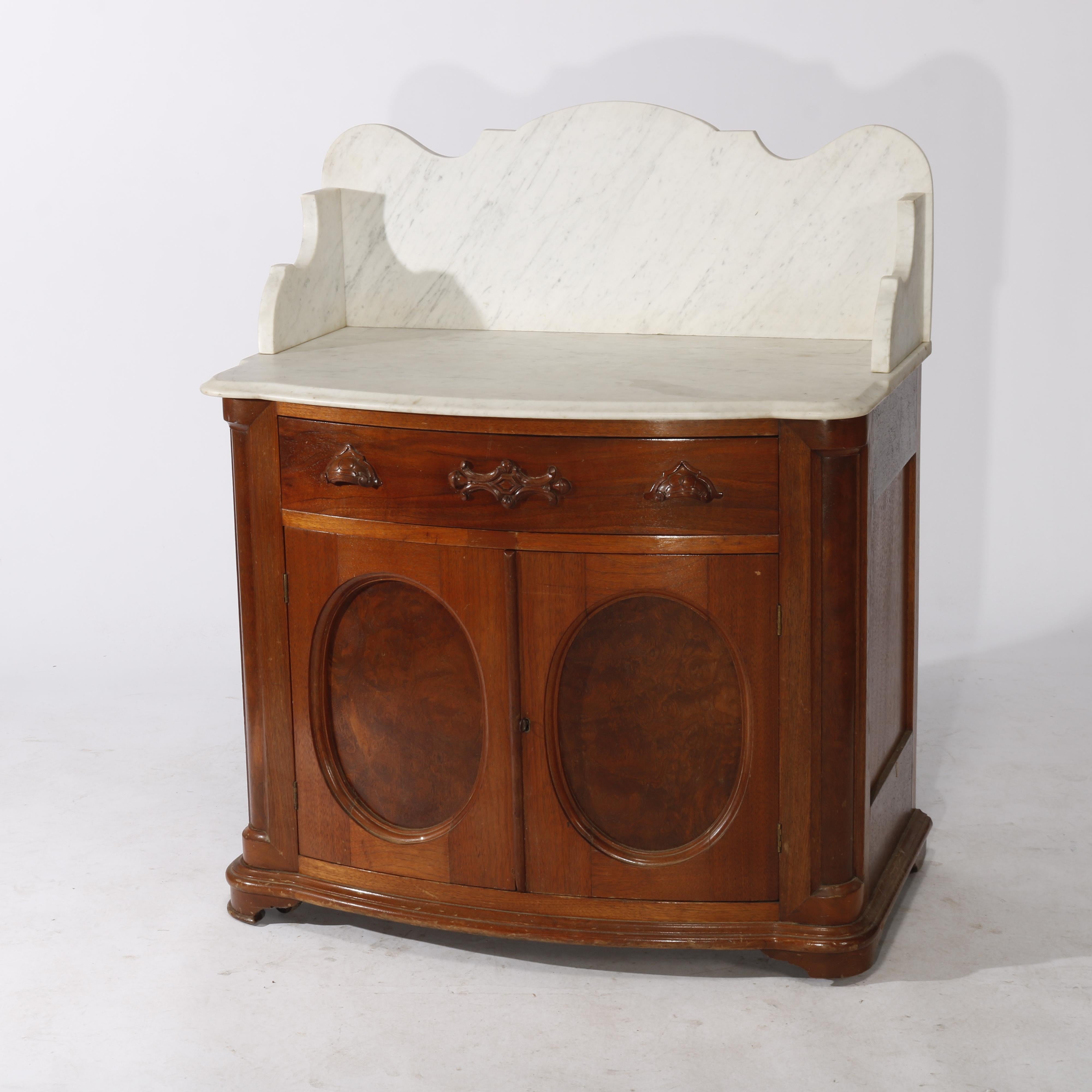 ***Ask About Reduced In-House Delivery Rates - Reliable Professional Service & Fully Insured***

Antique Victorian Walnut & Burl Marble Top & Bow-Front Commode with Paneled Sides and Doors Circa 1890

Measures - 42.5