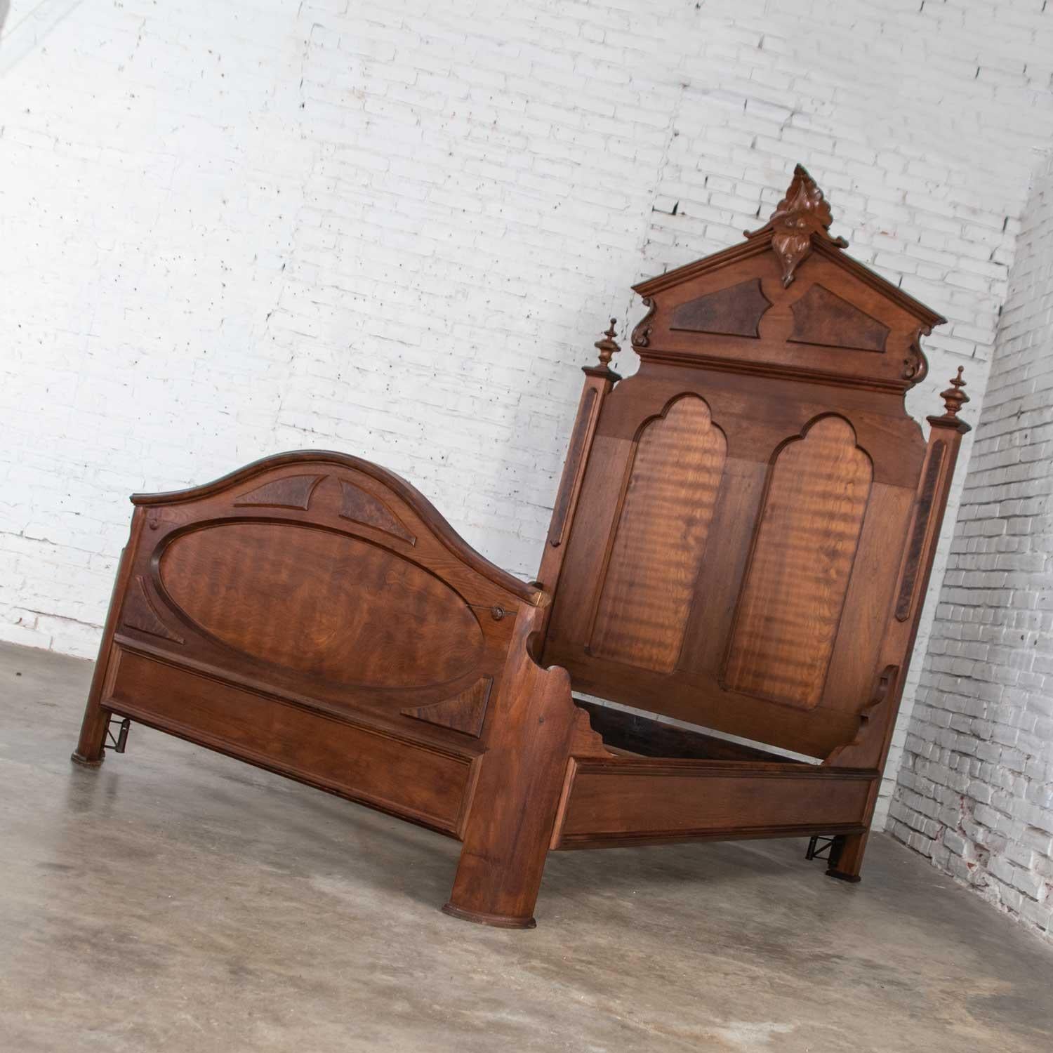 Gorgeous antique Victorian tall Lincoln style full size bed in solid walnut and walnut burl with footboard and side rails. It is in wonderful original vintage condition. That does not mean it is without beautiful age patina of marks and distressing