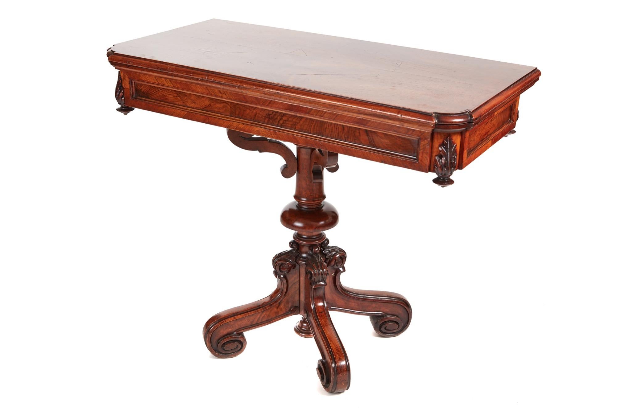 This is an unusual Victorian walnut card table with a swivel top, green baize interior and carvings to the frieze. It has a lovely turned carved column. It stands on four carved shaped legs. It is all in solid walnut.

Excellent condition and superb