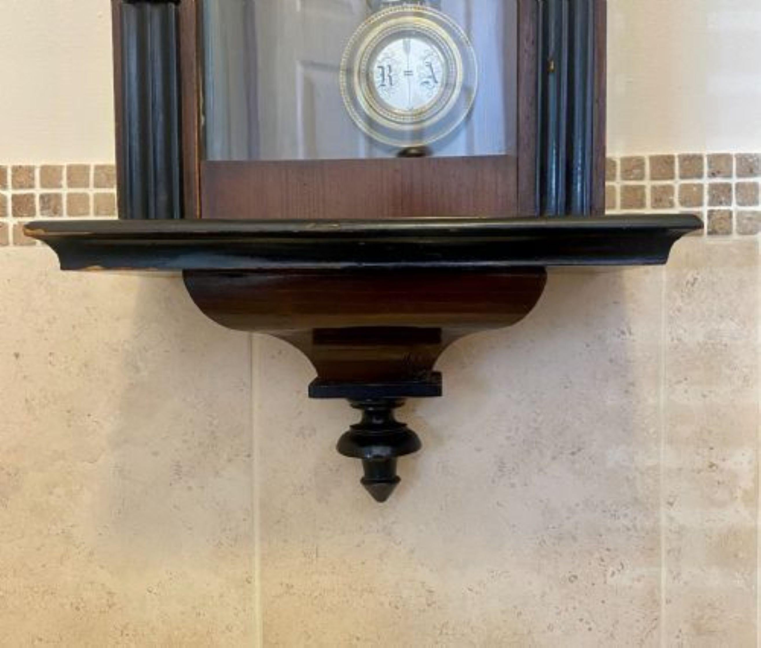 Antique Victorian walnut case Vienna wall clock having a circular porcelain dial with original hands, Roman numerals and original pendulum in a walnut and ebonised case with bobbing turned columns 
Please note all of our clocks are serviced prior to