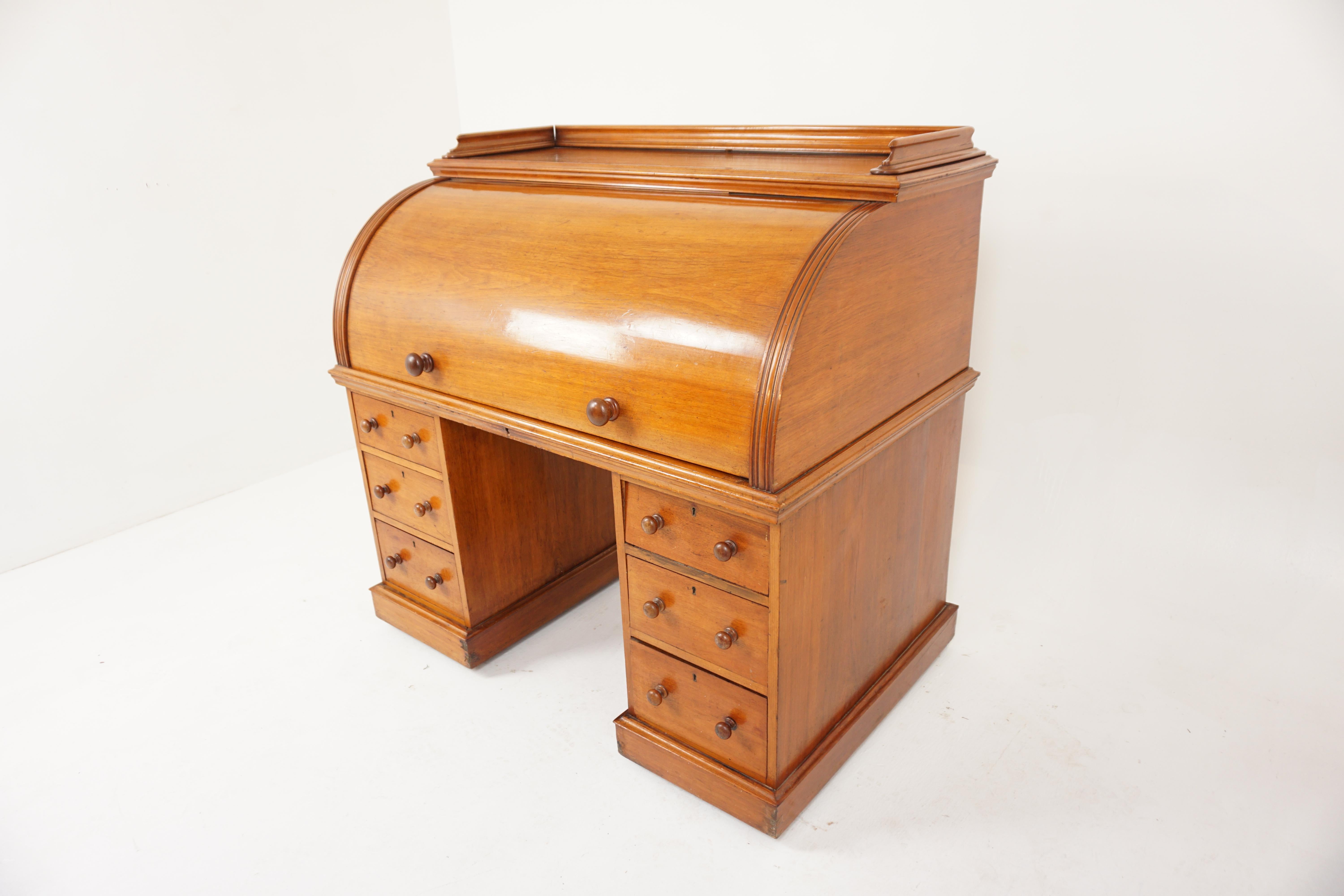 Antique Victorian Walnut Cylinder Roll up Desk, Roll Top Desk, Scotland 1870, H345

Scotland 1870
Solid Walnut 
Original Finish
Galleried Top
Free running roll top
Enclosing a leathered pull out
Writing slide
With hinged writing slope
Six buds eye