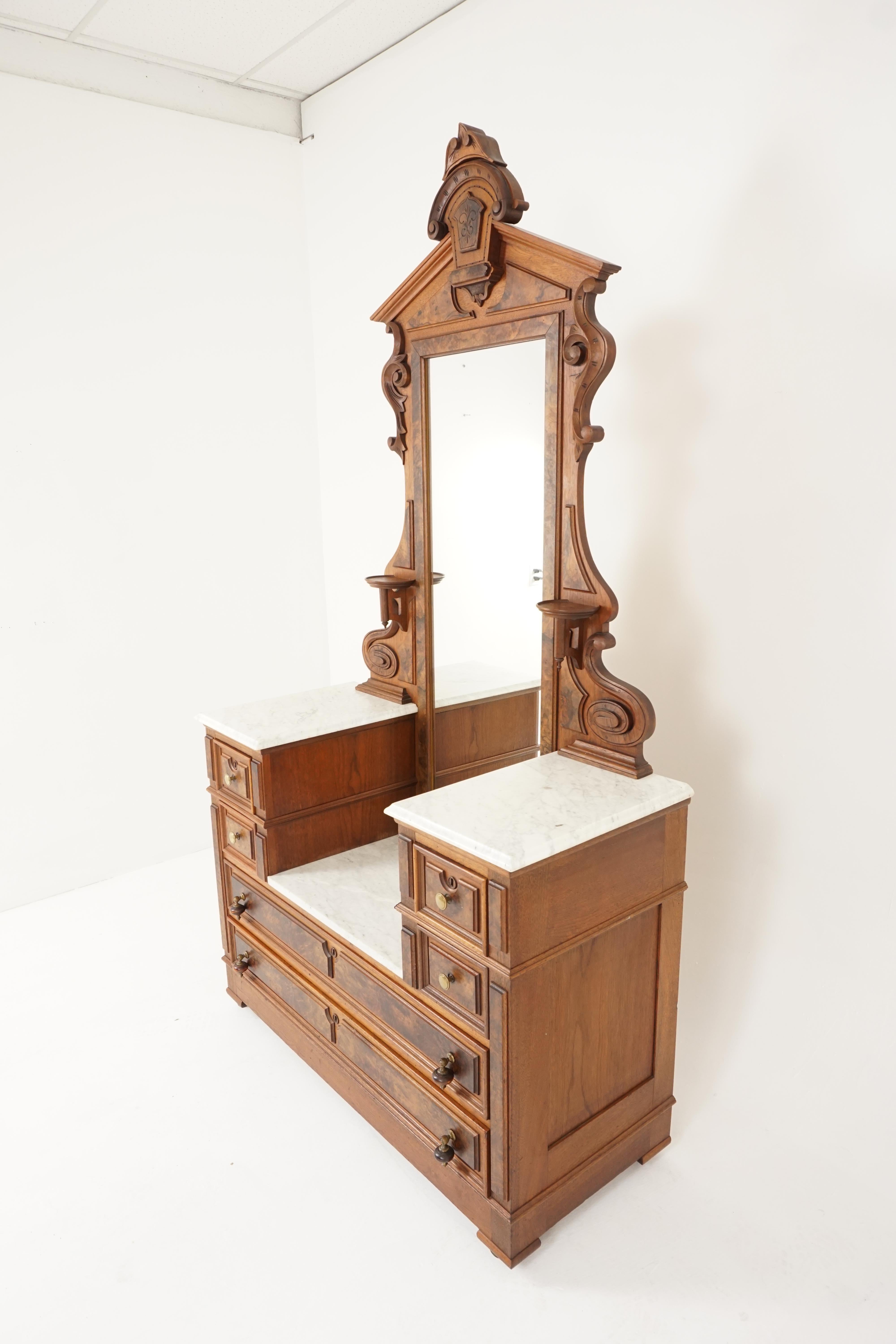 Antique Victorian walnut dresser, marble top, East Lake, American 1880, H199

American 1880
Solid walnut + burr walnut veneer
Original finish
Carved pediment on top
Framed mirror flanked by a pair of round candlestick holders
White marble sits on
