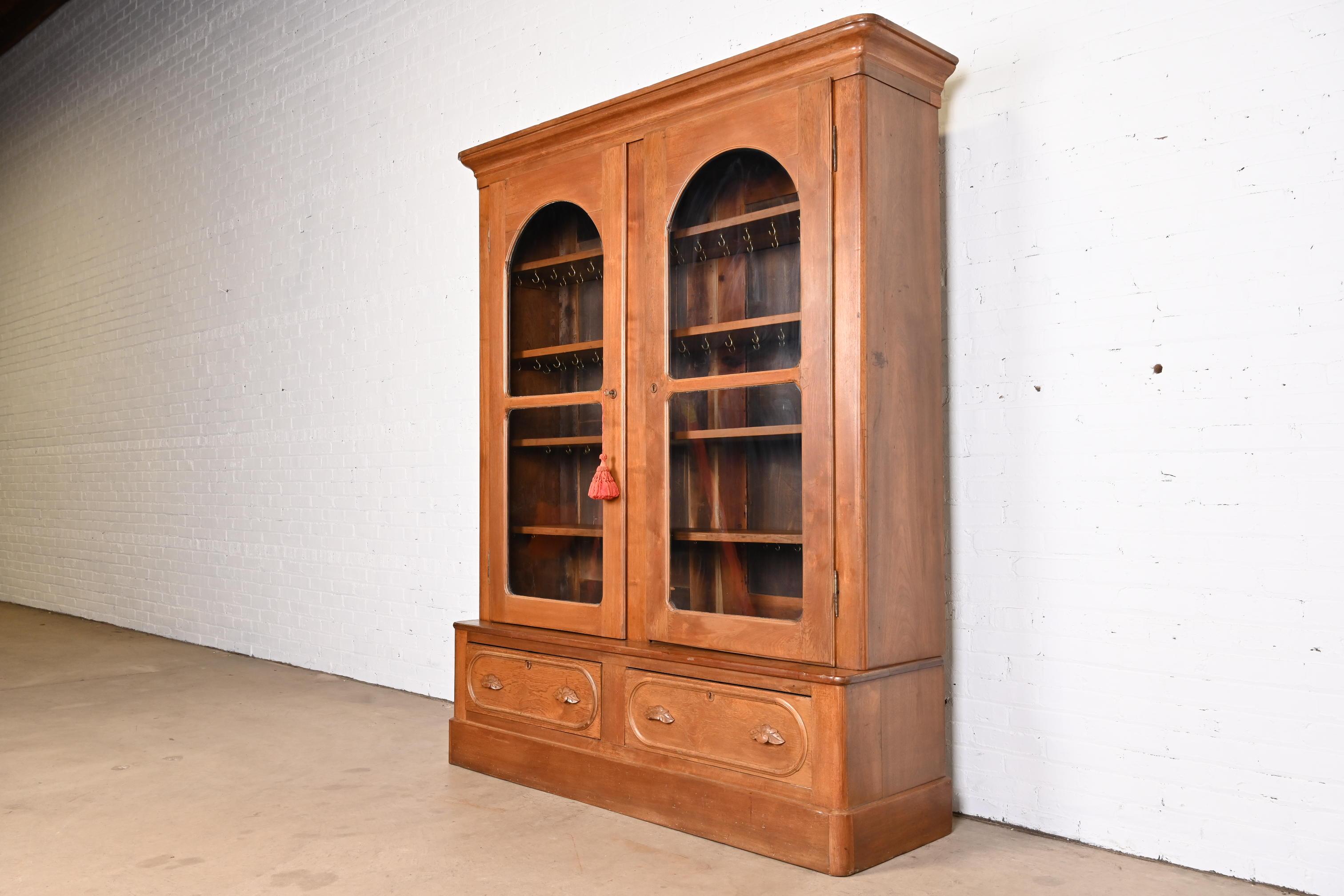 Antique Victorian Walnut Glass Front Bookcase Cabinet, Circa 1880s In Good Condition In South Bend, IN