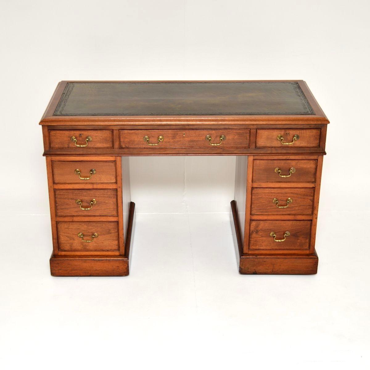 A very smart and well made antique Victorian Walnut leather top pedestal desk. This was made in England, it dates from around 1890-1900.

It is of lovely quality and is a useful size, with a generous kneehole and plenty of storage space within.