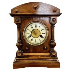 Antique Victorian walnut mantle clock 
