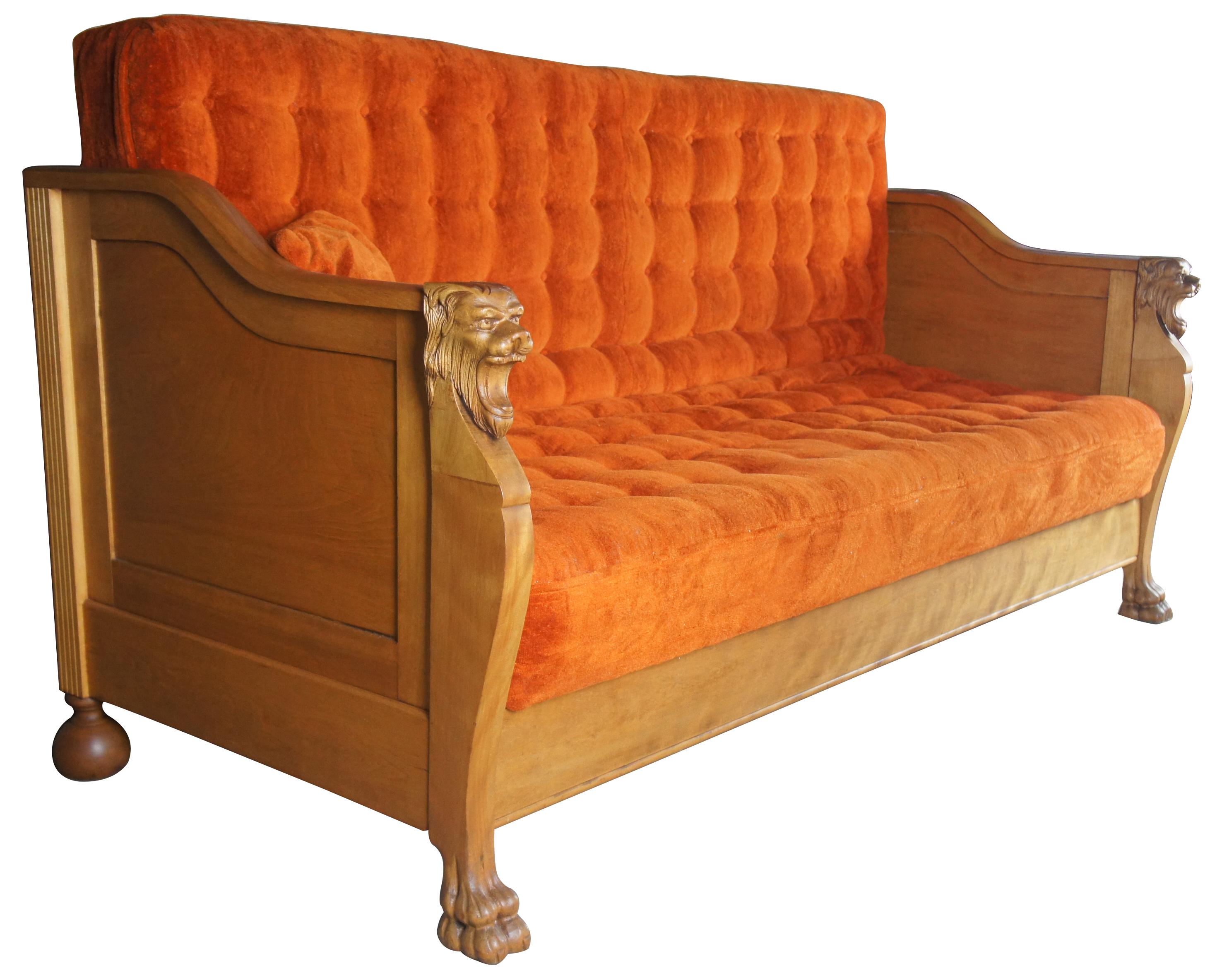 Antique Victorian walnut sofa bed Gothic Revival tufted figural lion heads paw

Amazing Victorian era sofa bed by Schauss MFG of Cleveland Ohio. Schauss operated from the late 19th-early 20th century. This sofa is made from walnut with lion head