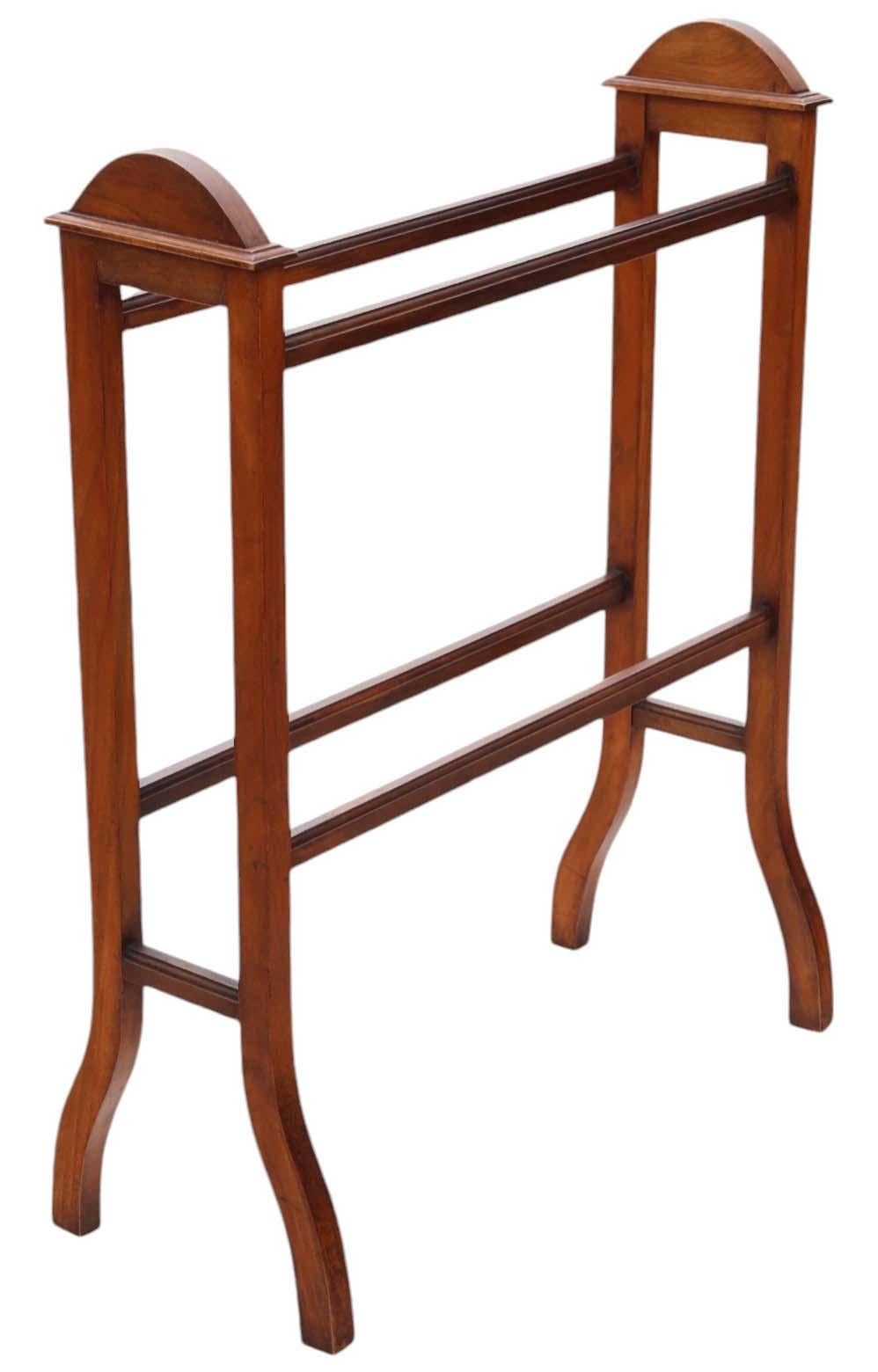 Antique Victorian walnut Towel Rail Stand - Quality Art Nouveau from circa 1900.

Solid construction with no loose joints or woodworm, promising longevity and stability.

This piece adds a touch of elegance to any space it occupies.

Overall