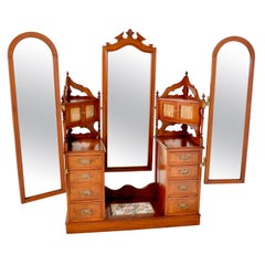 Ancienne coiffeuse victorienne à trois miroirs et deux caissons en noyer:: 1870