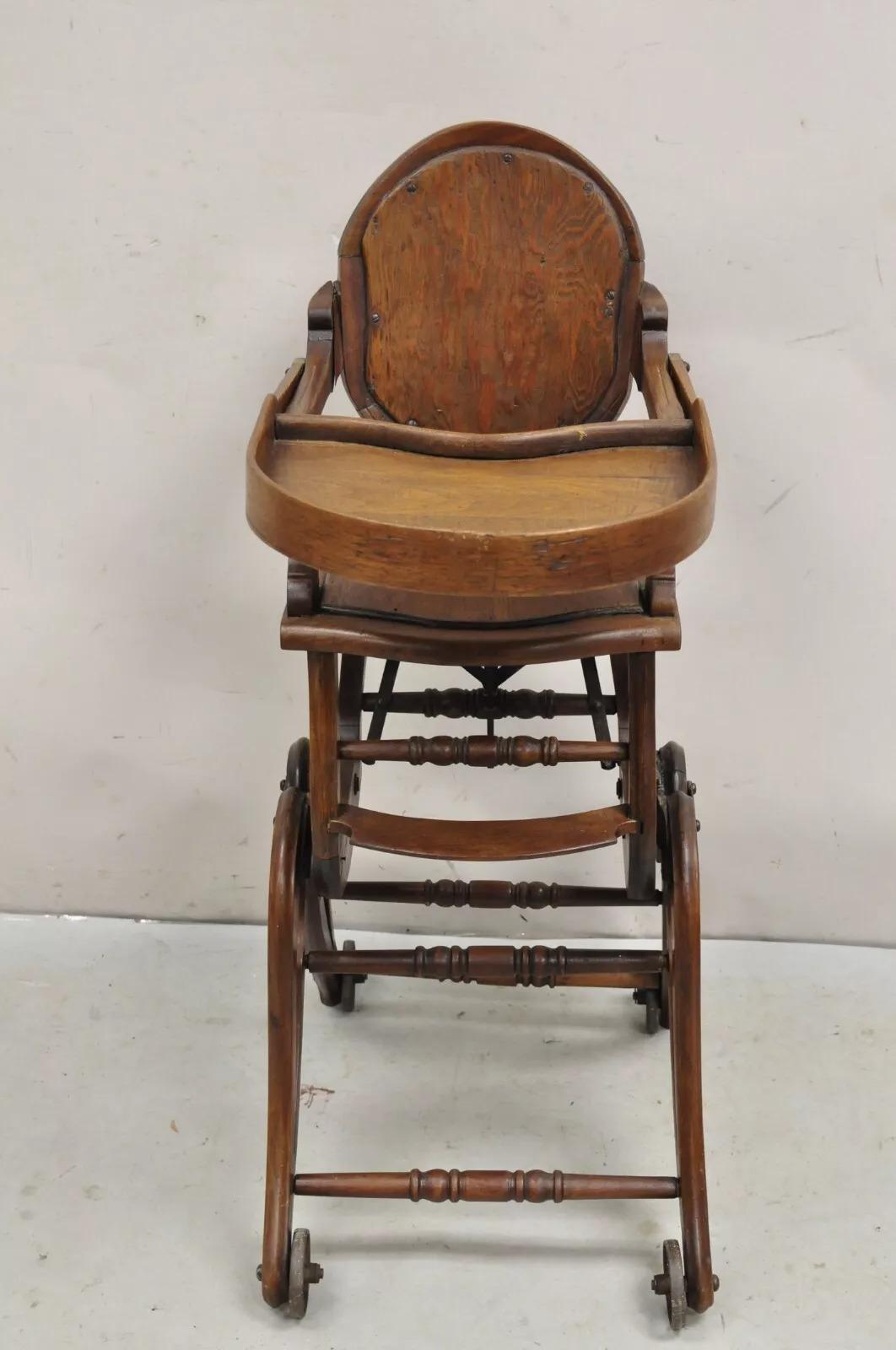 Antique Victorian Walnut Wood Convertible Combination Baby High Chair Stroller. Circa Late 19th Century. Measurements: 37