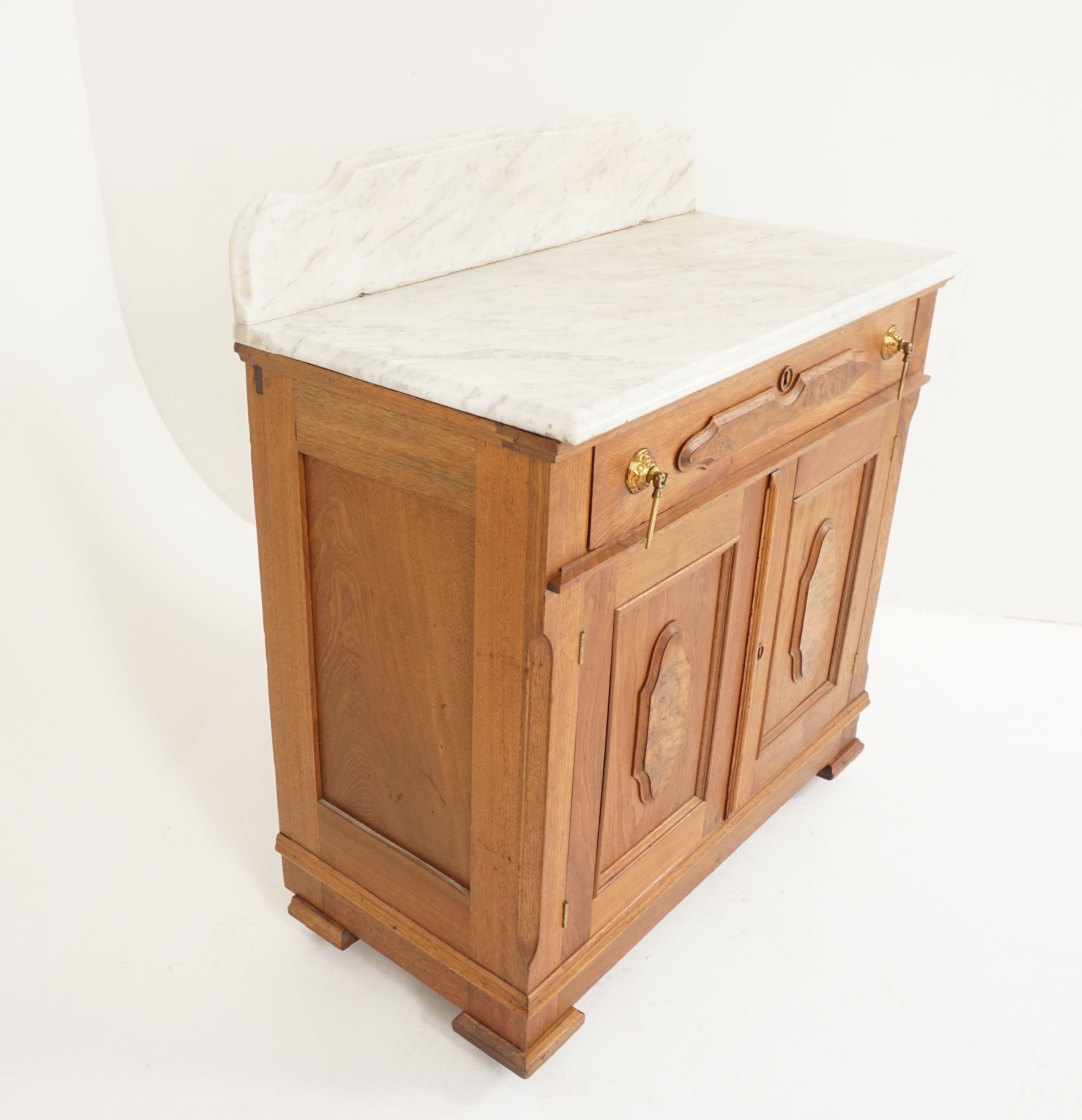 Antique Victorian Washstand, East Lake, walnut marble top, American 1880, B2518

American 1880
Solid walnut + burr walnut veneer
Original finish
Shaped marble top
Original shaped back splash
Single paneled drawer below
Incomplete hardware to