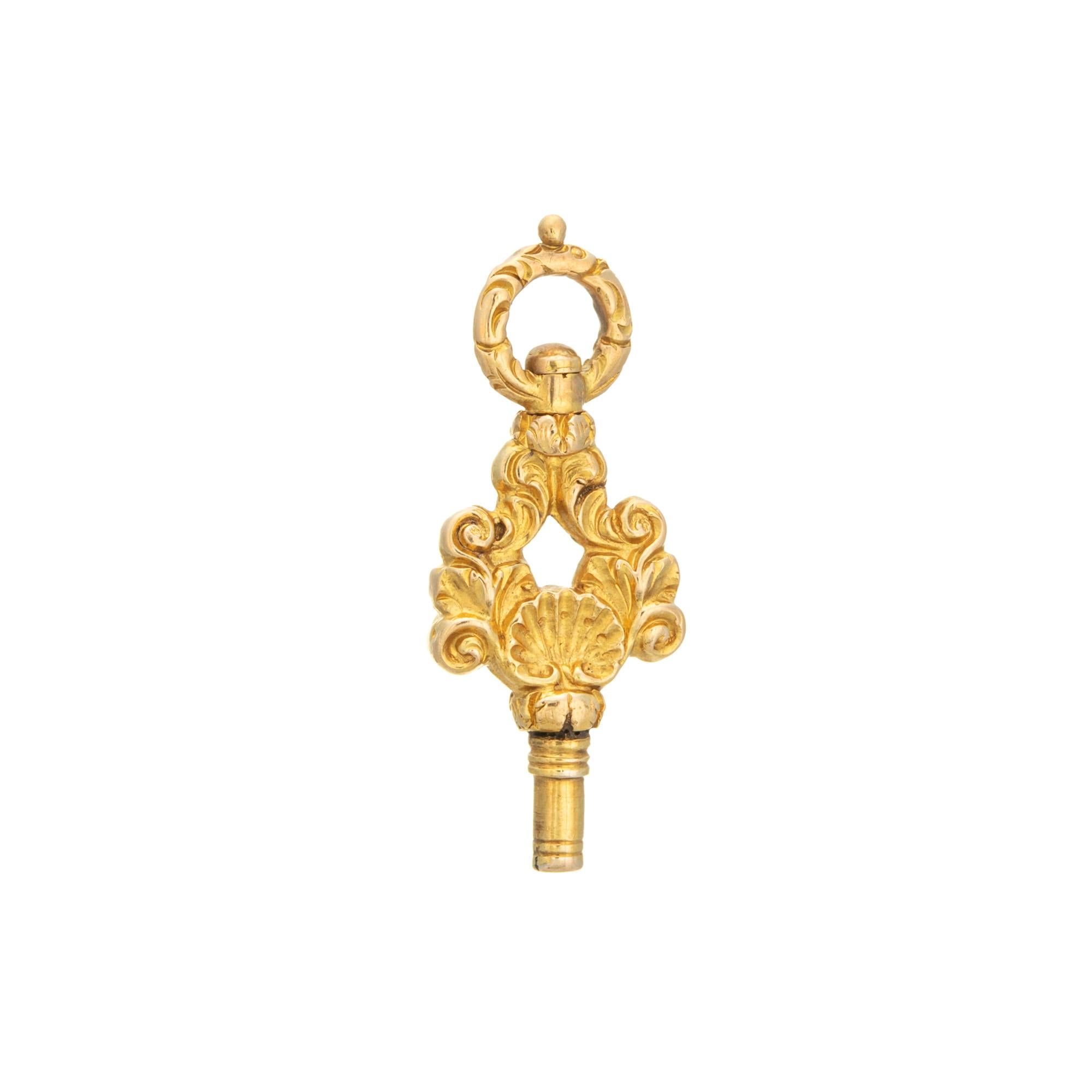 Finely detailed antique Mid-Victorian fob (circa 1860s to 1870s) crafted in 18 karat yellow gold. 

The beautifully detailed antique watch key fob was originally worn by a gentleman with a pocket watch. The key would have wound the movement of the