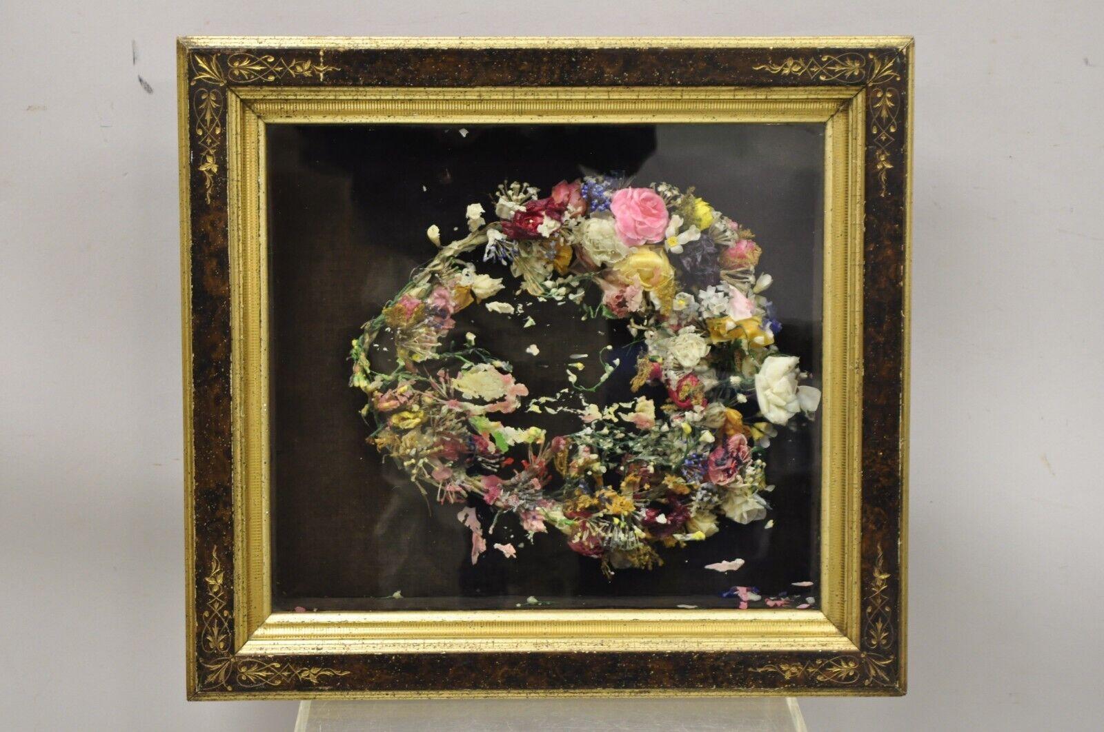 Antique Victorian wax flower floral mourning wreath shadow box frame oddity. Item features a colorful wax flower wreath, gold giltwood shadow box frame with carvings, glass front, very nice antique item. Circa 19th Century. Measurements: 21