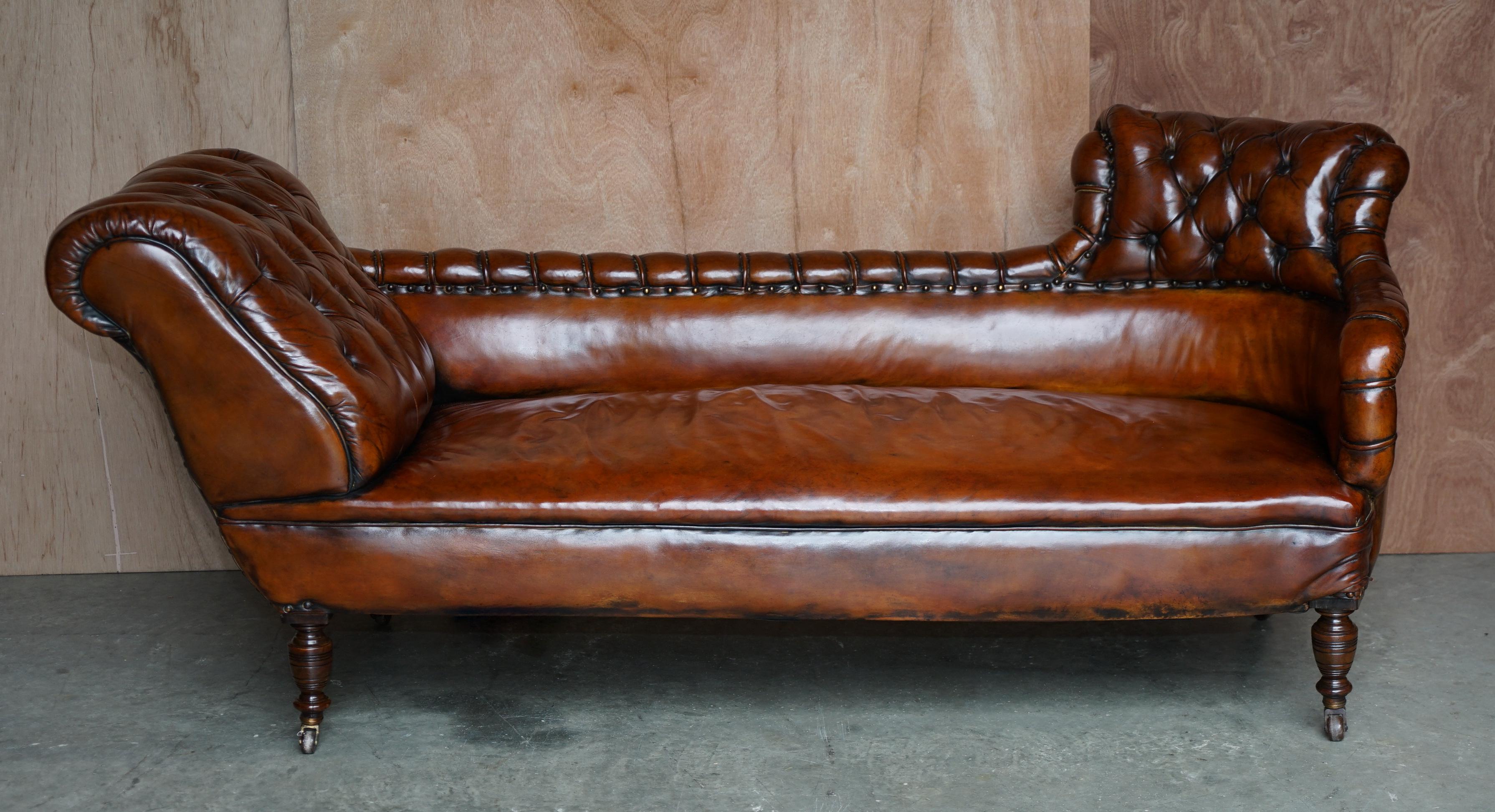 We are delighted to offer this very rare fully restored Chesterfield tufted sofa chaise lounge in whiskey brown leather.

A very rare example, I have never seen this back before, it is an English piece but has a very continental feel to it. The