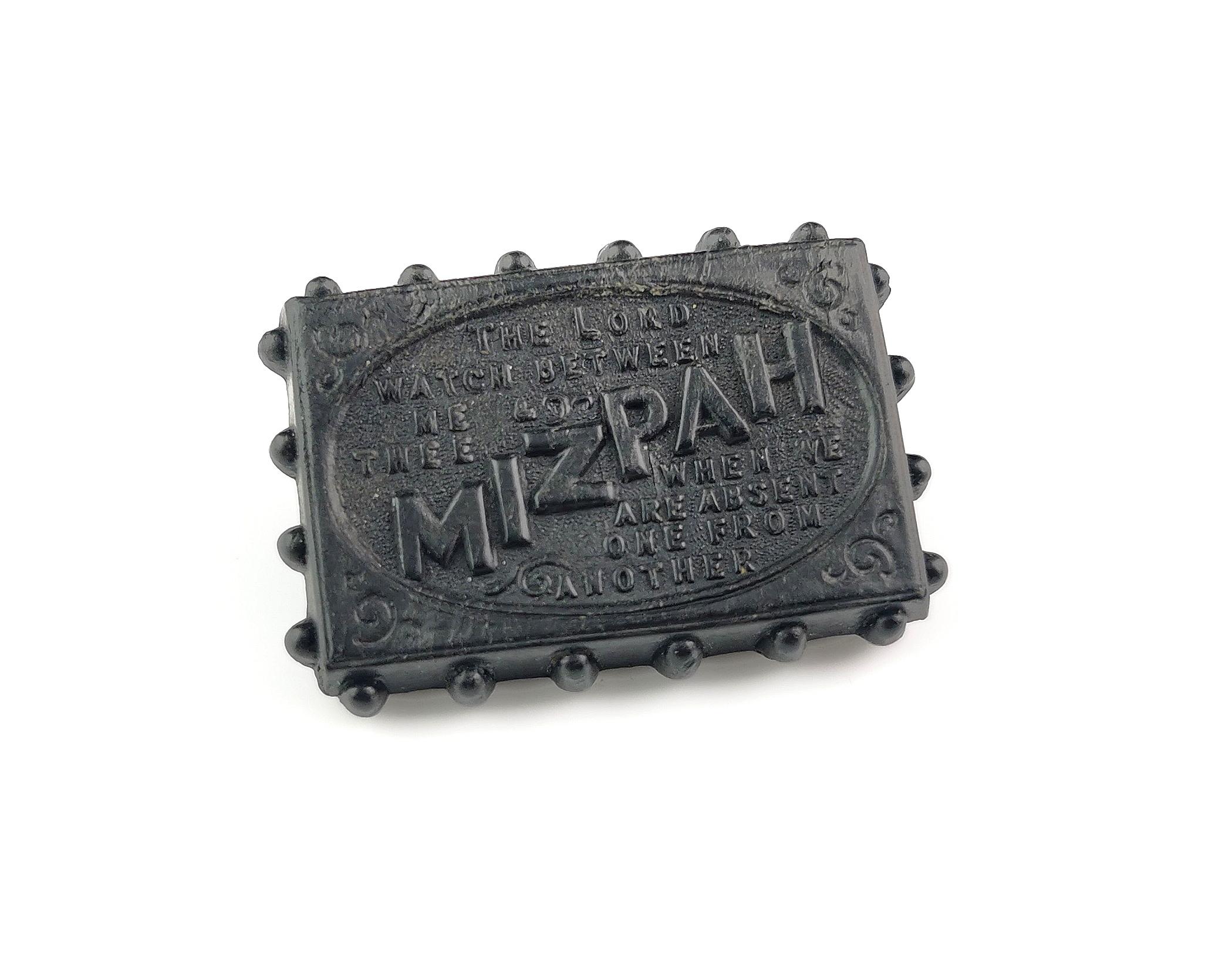 A lovely antique Victorian Whitby Jet Mizpah brooch.

Made from genuine Whitby Jet, it is a rectangular shape with a beaded edge and text to the centre.

Reads Mizpah, the Lord watch between me and thee when we are absent from one another.

A lovely