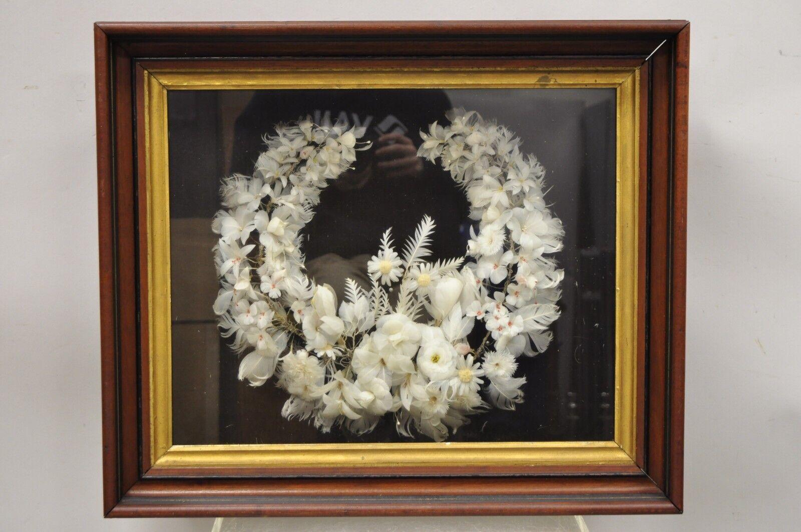 Antique Victorian White Feather Flower Mourning Wreath Mahogany Shadow Box Frame. Item features and ornate white feather flower arrangement, mahogany shadow box frame, gold gilt trim, glass front, very nice antique item. Circa 19th