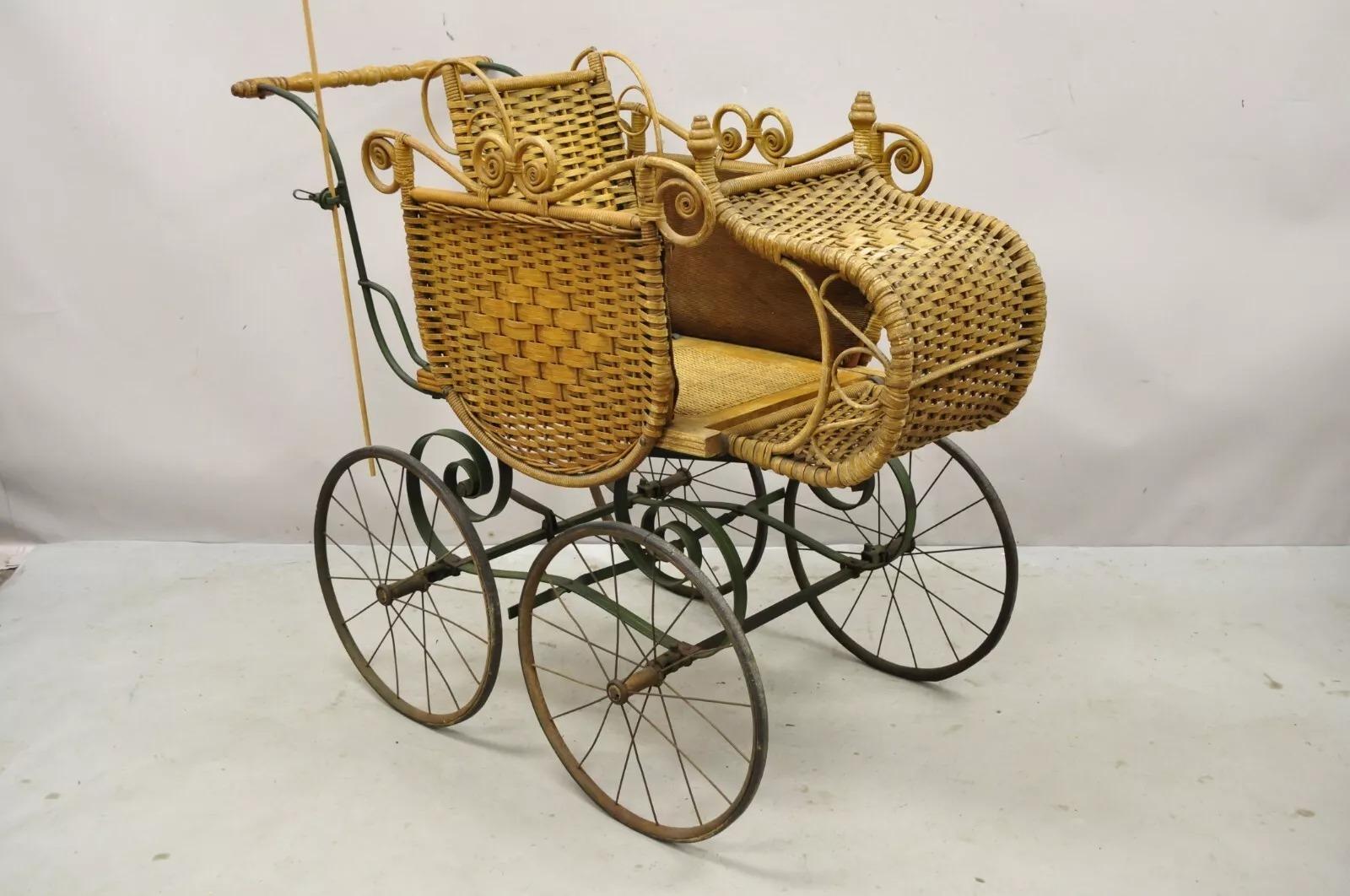 Antique Victorian Wicker Vintage Baby Buggy Stroller Carriage Full Size. Details: Adjustable footrest, wicker frame, wooden handle, removal parasol umbrella, very nice antique item, quality American craftsmanship, great style and form. Age: 19th