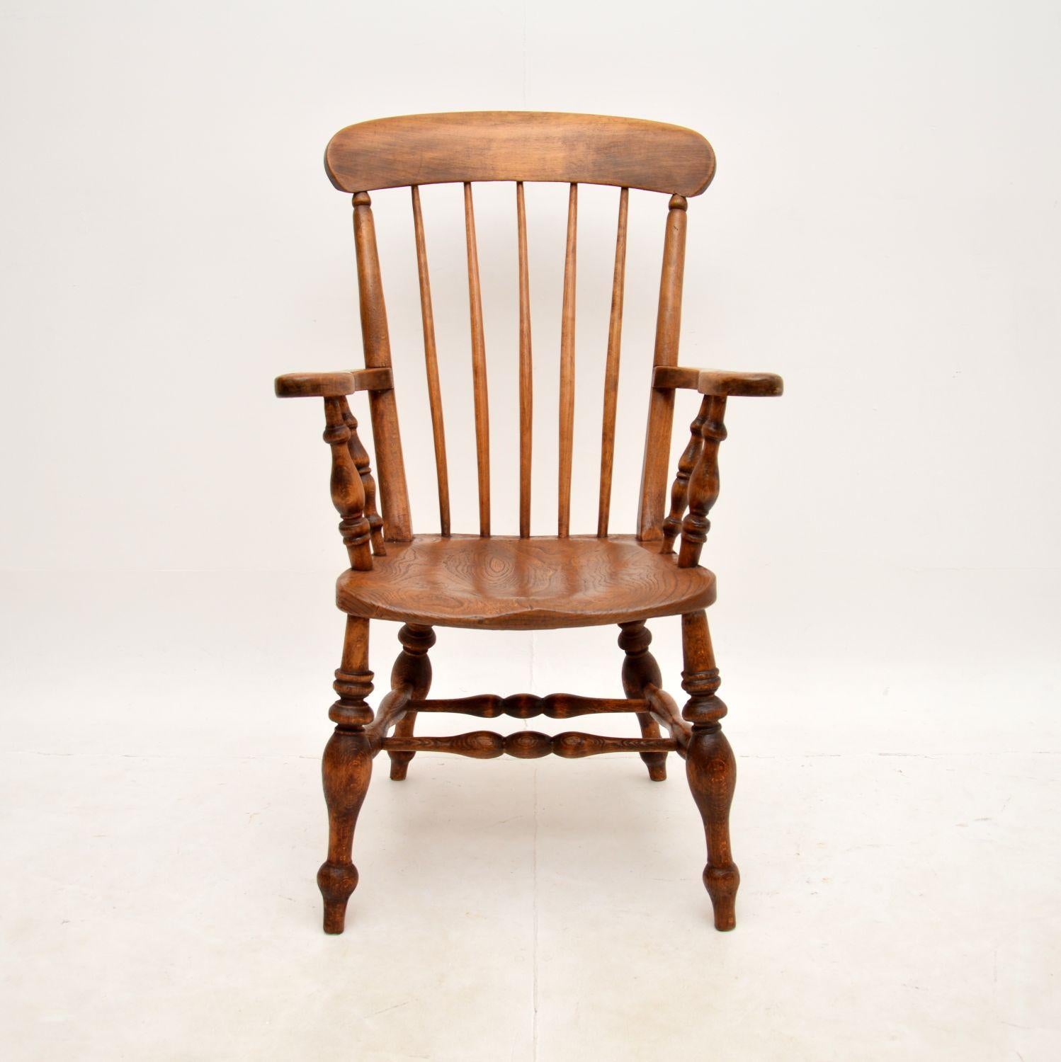 A wonderful original antique Victorian Windsor armchair. This was made in England, it dates from around the 1860-1880 period.

The quality is fantastic, the seat is made from stunning solid elm and the rest of the frame appears to be solid birch.