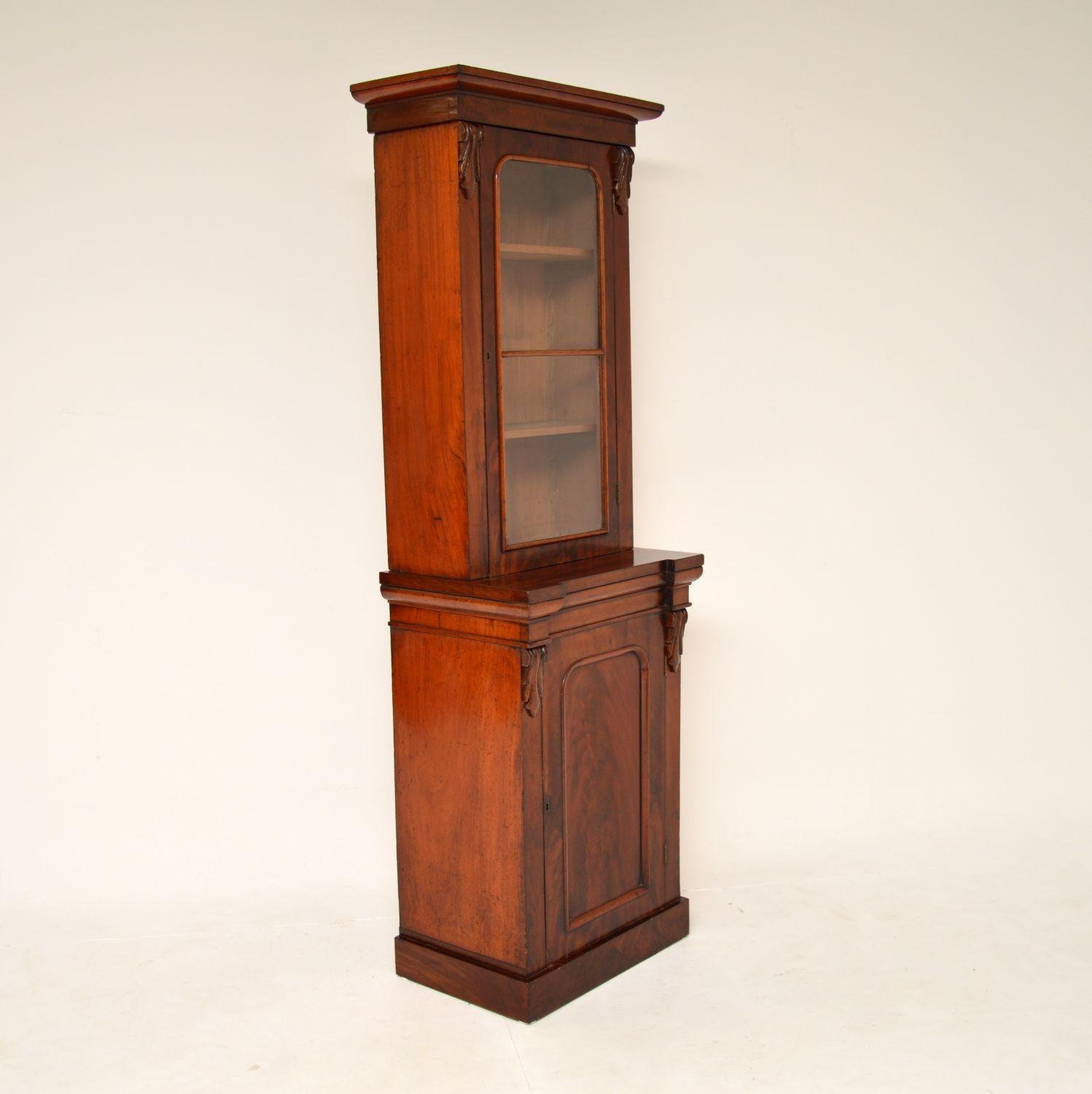 A very unusual and useful original antique Victorian bookcase. This was made in England, it dates from the 1860-80’s.

It has very slim design and takes up very little floor space, while offering plenty of storage space inside. This sits on a plinth