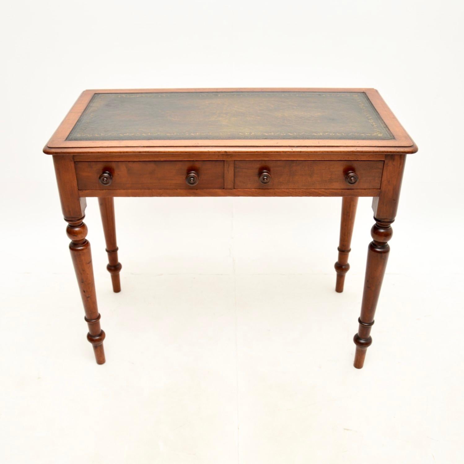 A smart and very useful antique Victorian writing table / desk. This was made in England, it dates from around the 1860-1880 period.

It is very well made and is a very useful size, not too deep from front to back. The inset leather writing surface