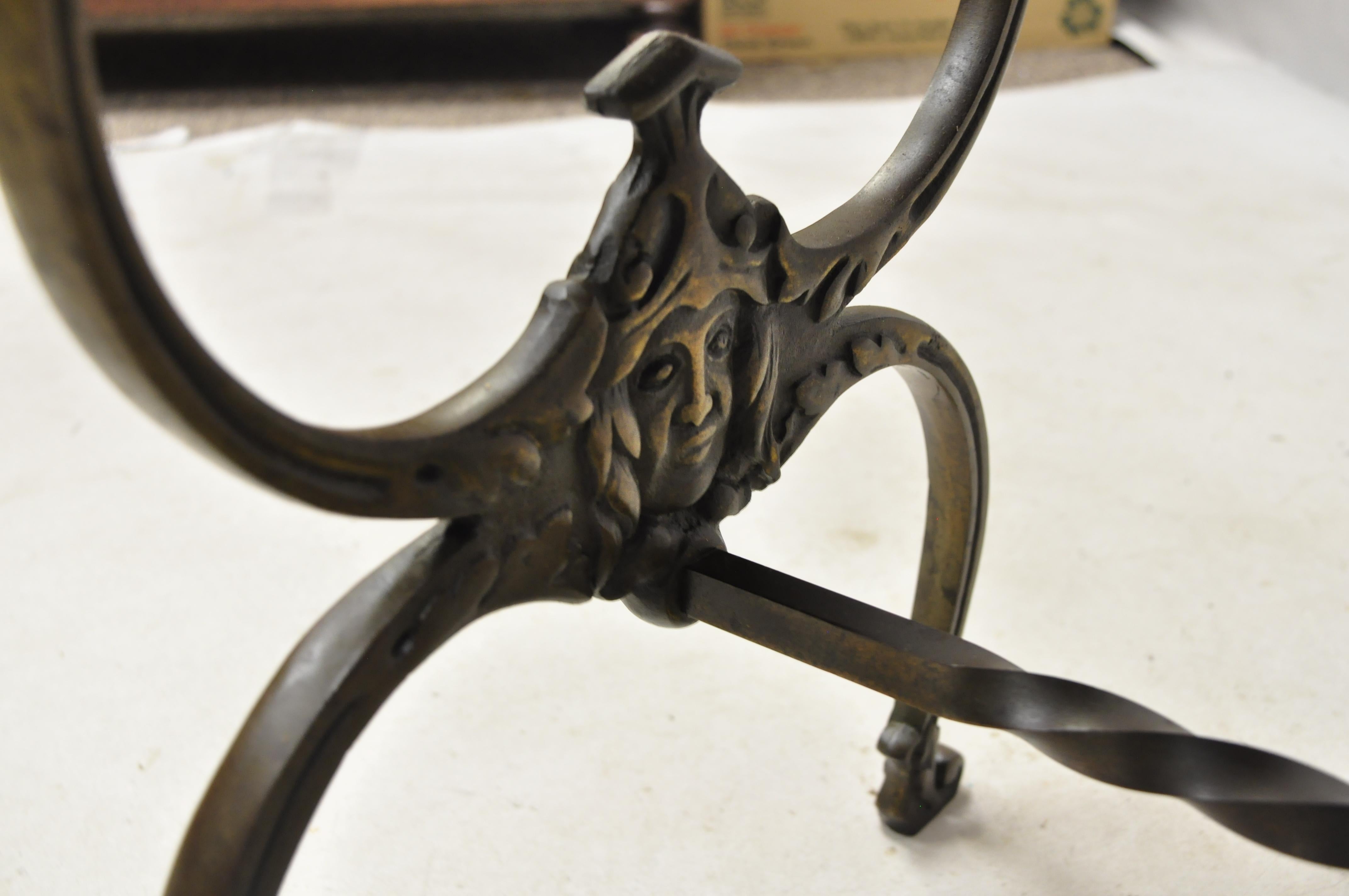 Cast Antique Victorian Wrought Iron Figural Bench with Faces and Twisted Stretcher