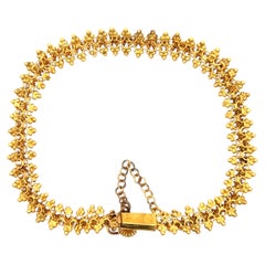 Bracciale antico vittoriano in oro giallo con perline a forma di petit Daisy Flower