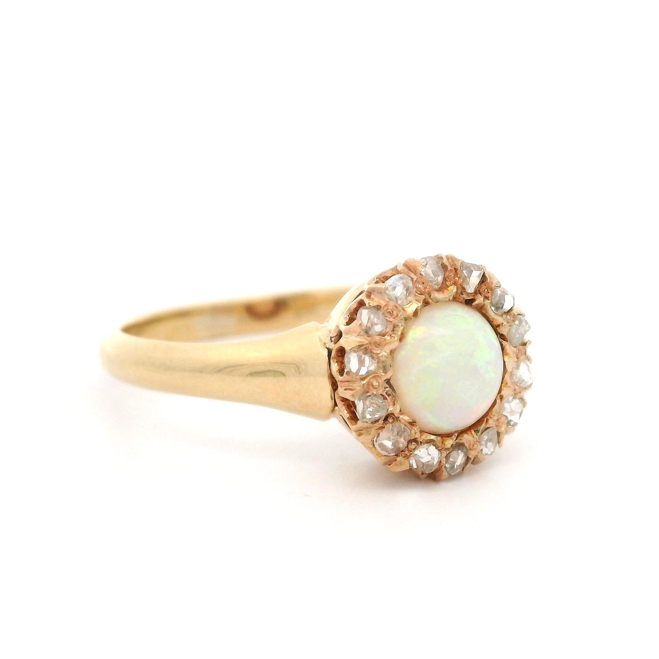 --Stone(s):--
(1) Natural Genuine Opal - Round Cabochon Cut - Prong Set - White Base w/ Beautiful Play of Color - 5.4mm (approx.)
(14) Natural Genuine Diamonds - Old Rose Cut - Pave Set - Nice White Color - 0.20ctw (approx.)

Material: Solid 10k