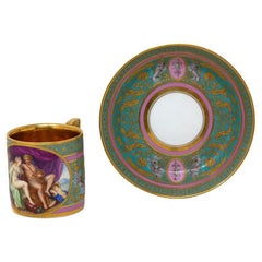 Taza y platillo antiguos de porcelana de Viena