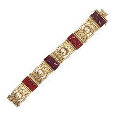 Bracciale antico viennese Art Deco in oro 14 carati con intagli di corniola e boccioli di fiori