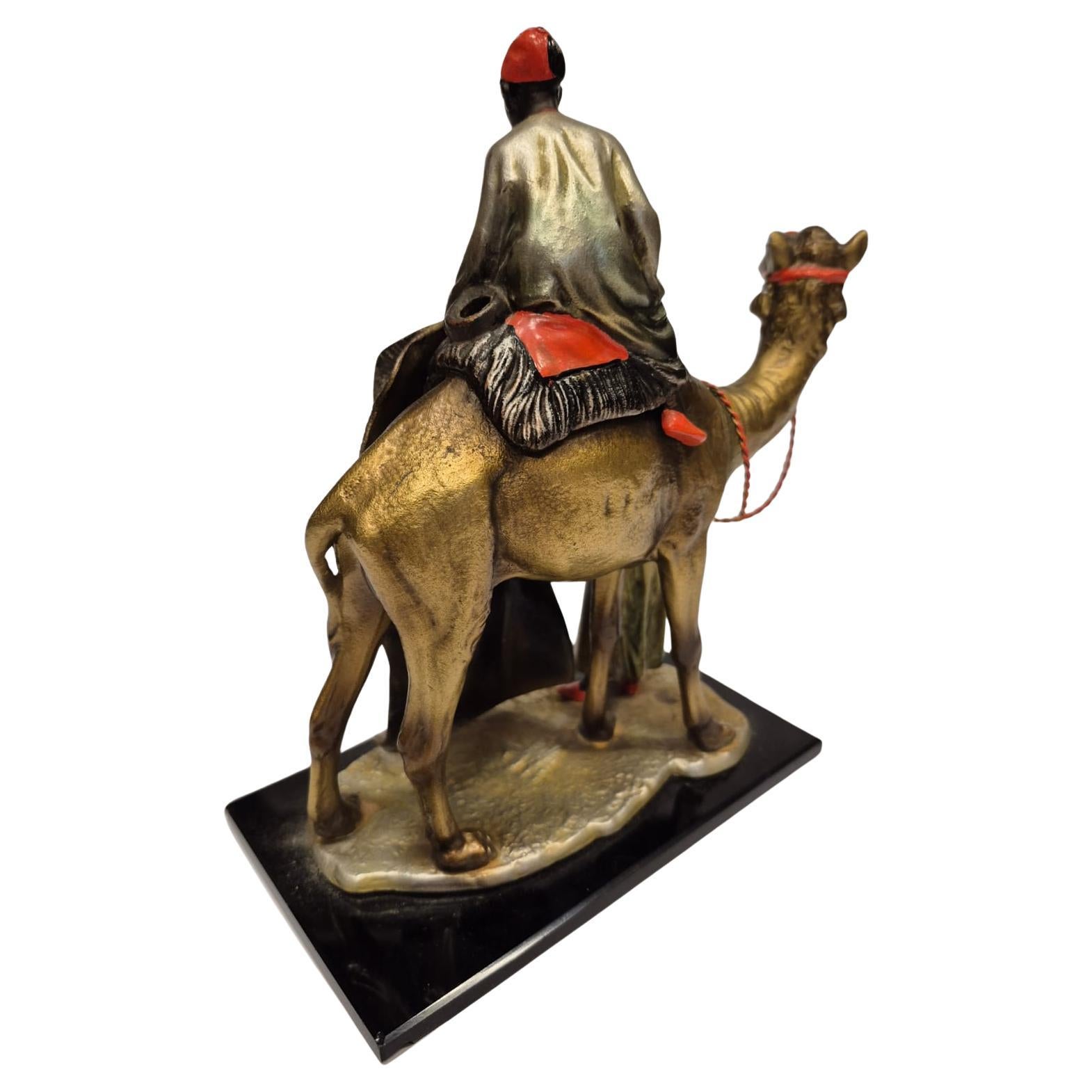 Milieu du XXe siècle Antique Viennese table lighter made of cold-painted bronze with carpet seller en vente