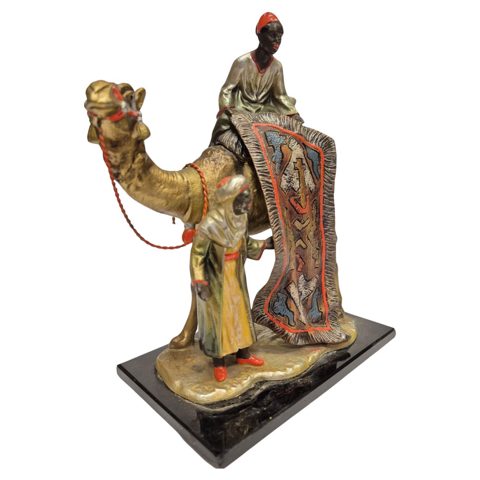 Bronze Antique Viennese table lighter made of cold-painted bronze with carpet seller en vente