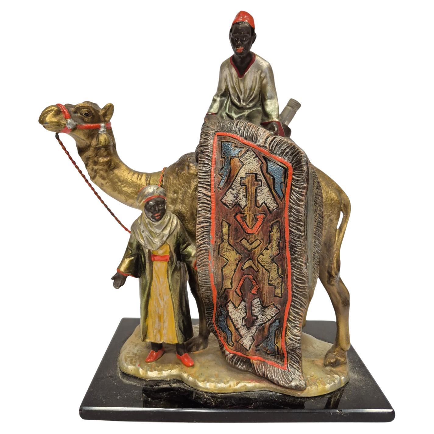 Antique Viennese table lighter made of cold-painted bronze with carpet seller en vente 2