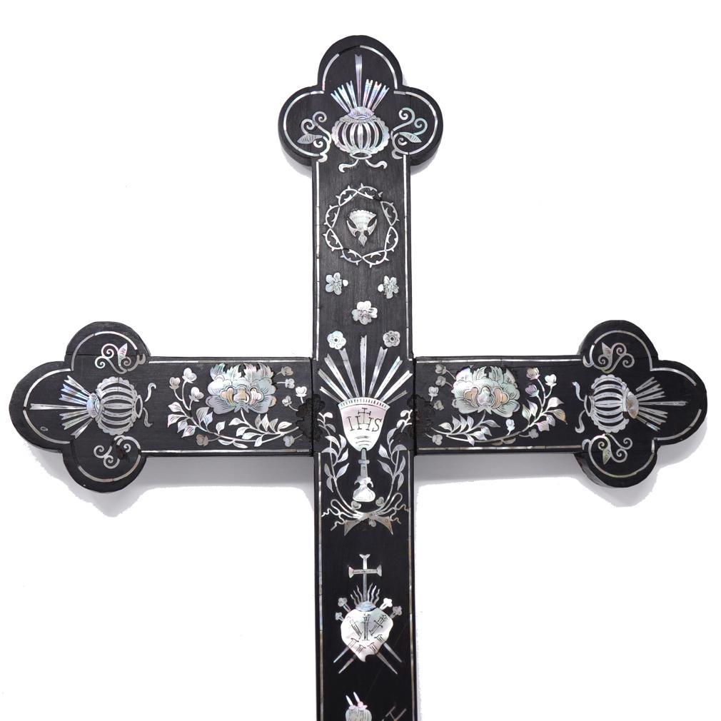 Vietnamese or Southern Chinese Catholic Latin Cross, hardwood inlaid with Sea Snail shell from the South China Sea having decorative floral scrolling and Christian religious symbols including; a dove symbol of the holy spirit, surrounded by a crown