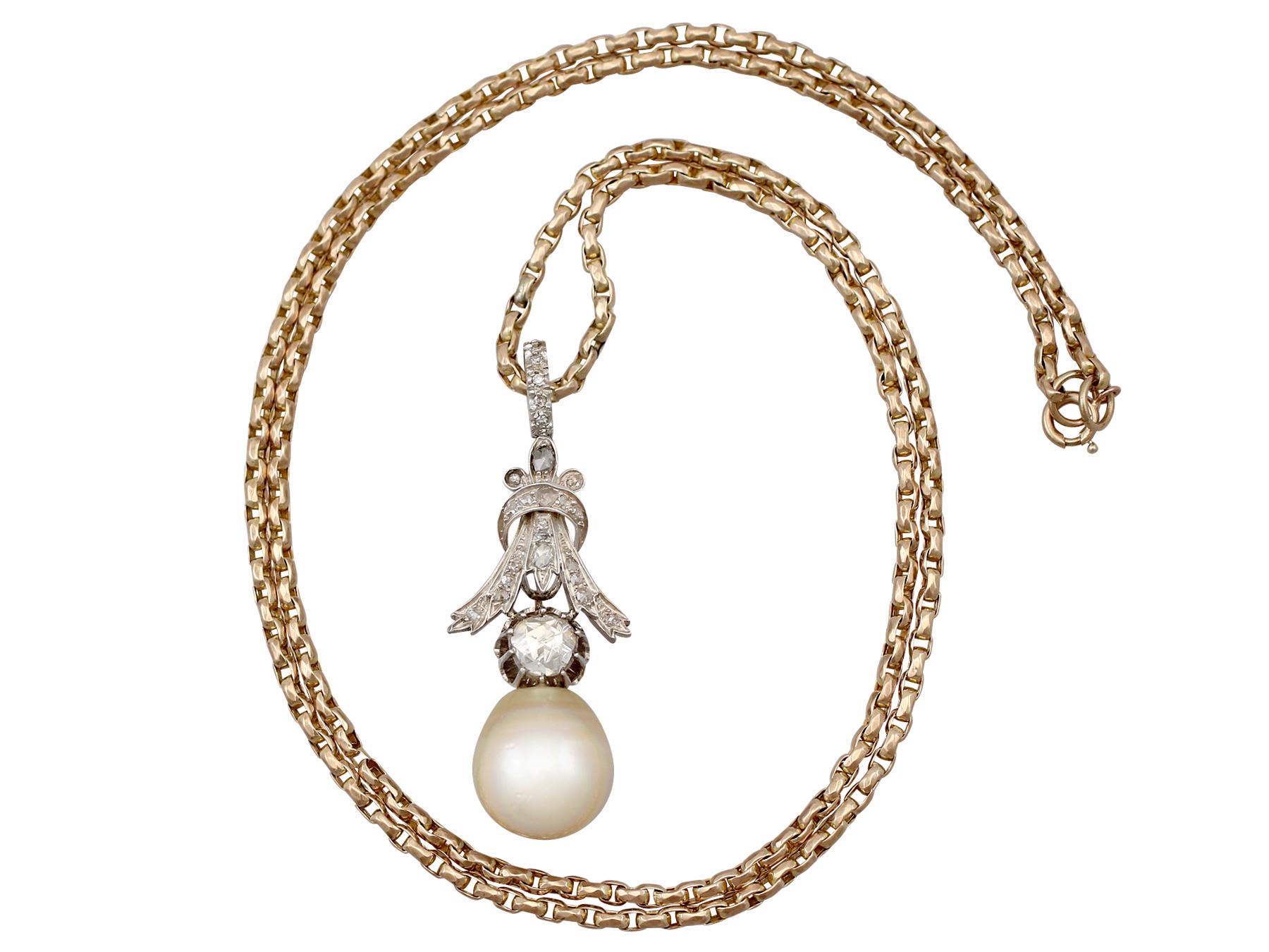 A stunning antique and vintage 1.23 carat diamond and South Sea pearl, 18 karat yellow gold and silver set pendant; part of our diverse antique jewelry and estate jewelry collections.

This stunning, fine and impressive antique pearl pendant has