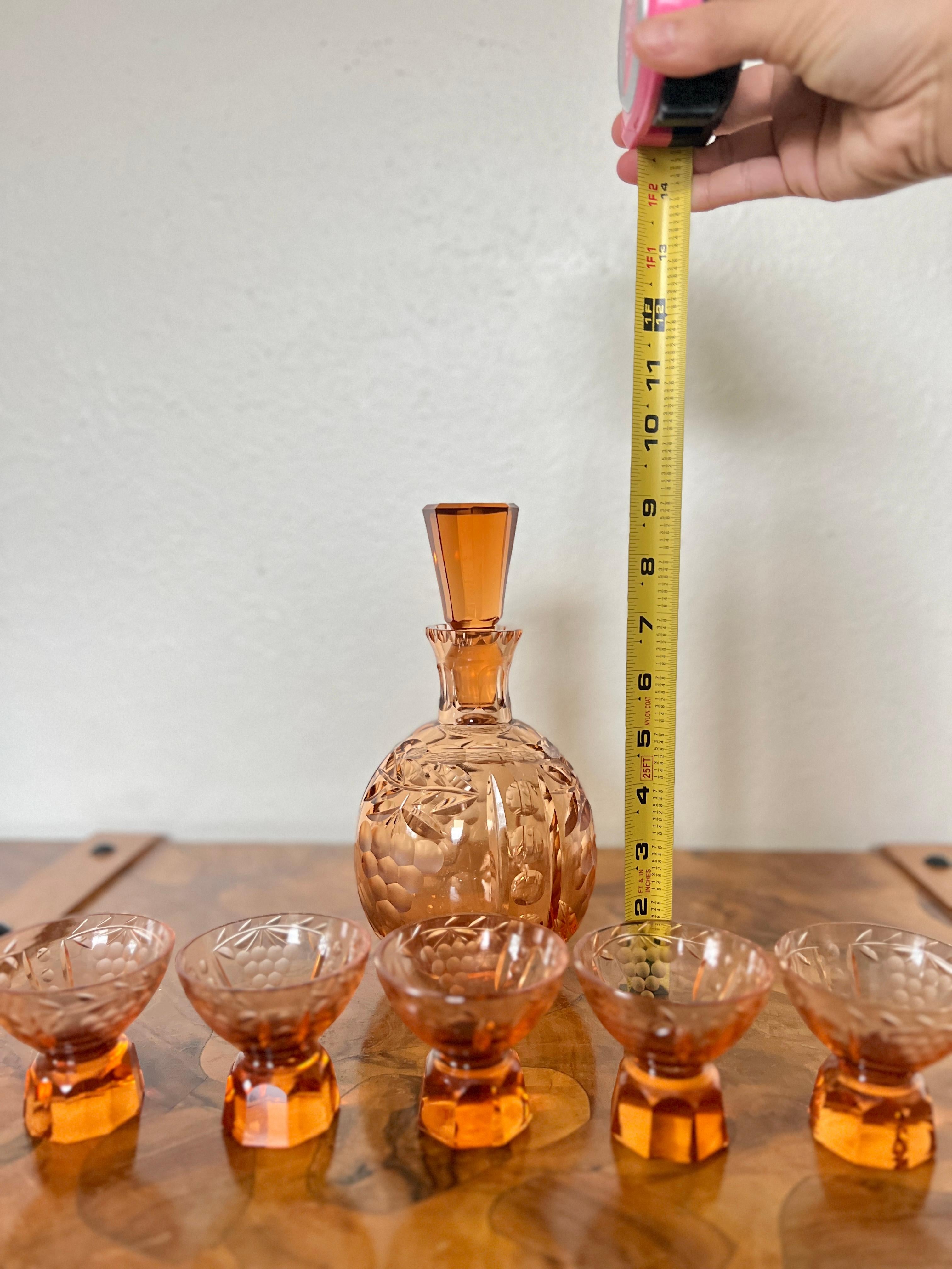 Antique amber cut crystal decanter for wine, liquor or any other solid drink. The decanter is of great quality and has a sleek elegant design. The floral decor is hand cut and hand polished. The colour is unusual and rare. Highly decorative item. An