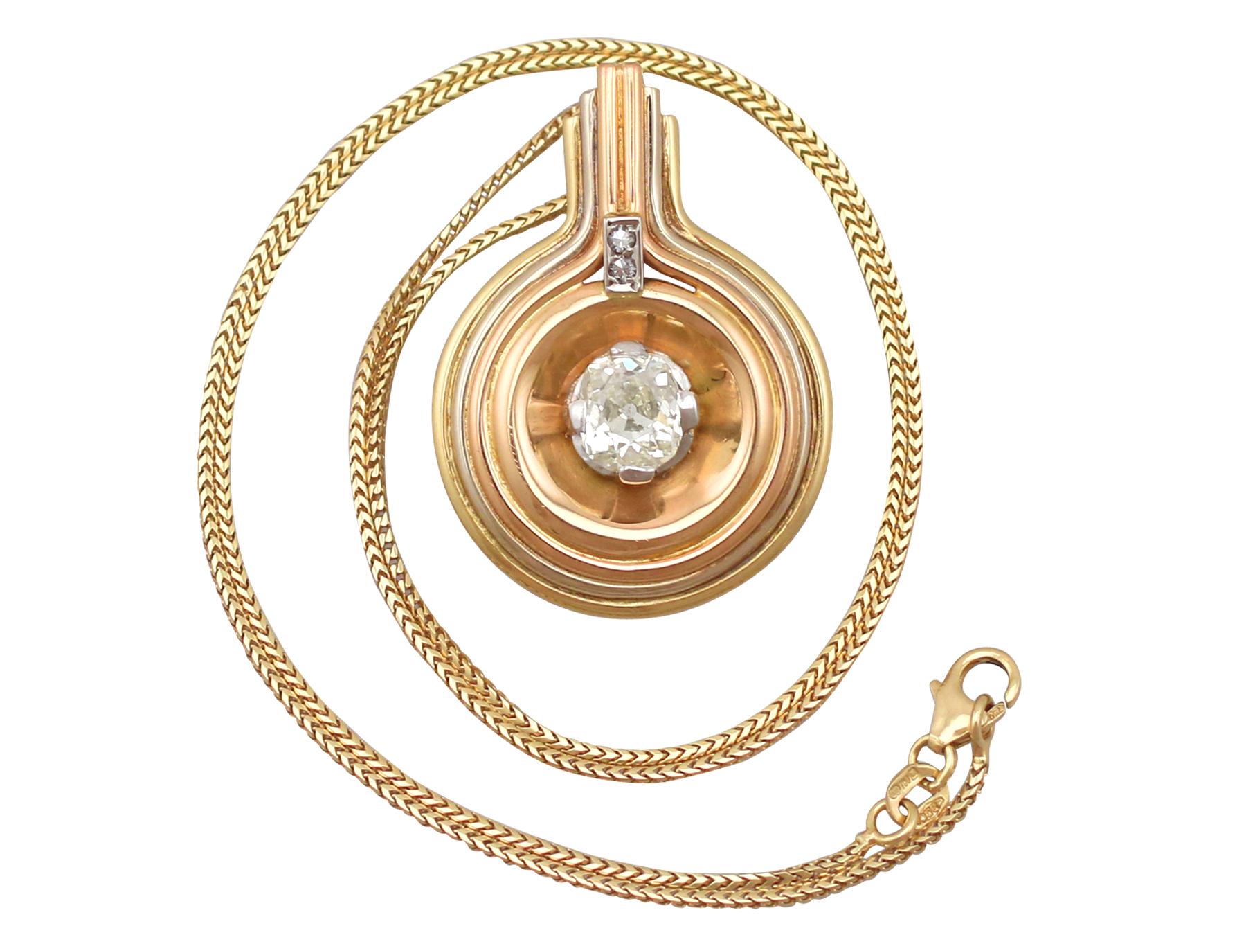 A fine and impressive antique diamond and 18 karat tri-gold pendant in the Art Deco style; part of our diverse antique and vintage jewelry/estate jewelry collections

This impressive Art Deco pendant has been crafted in tri-colour 18k gold.

This