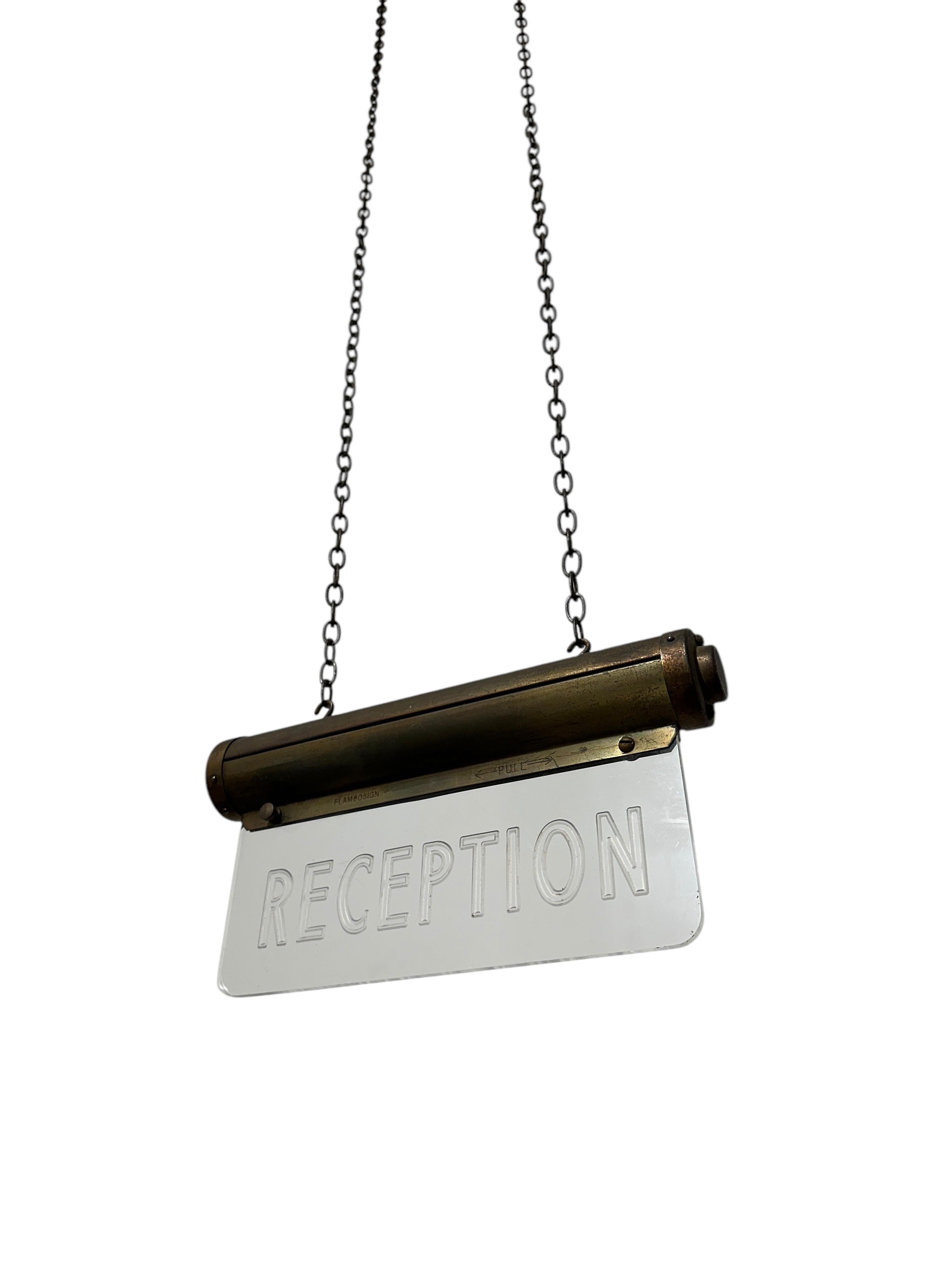 - A fabulous Art Deco illuminated Reception sign from renowned manufacturers 'Flambosign', England circa 1930.
- The worn brass casing marked 'Flambosign' houses an etched lucite perspex sign which glows beautifully when lit.
- Wonderful decorative