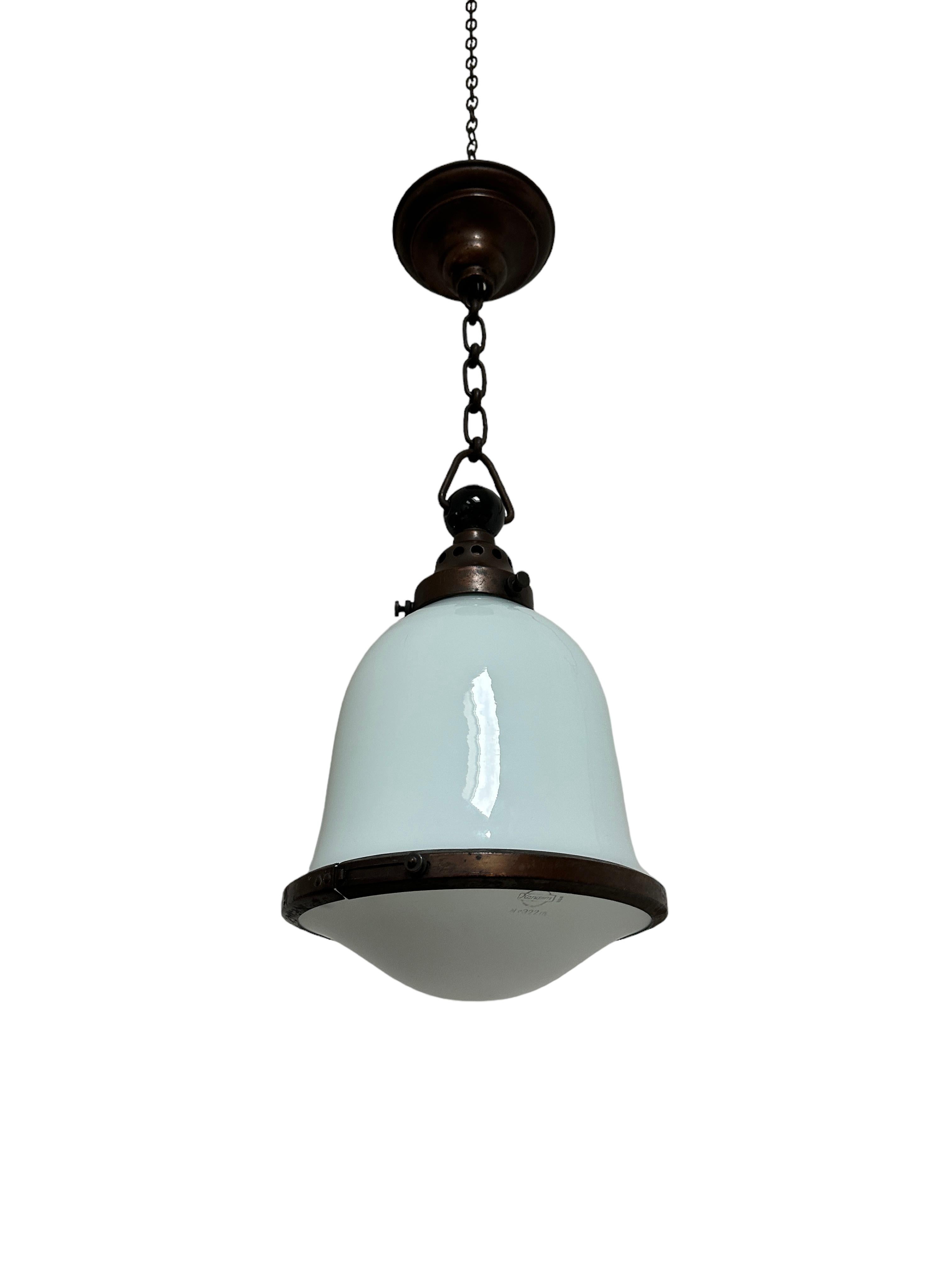- An original and extremely rare two tone Bauhaus ceiling pendant by Kandem, Germany circa 1920.
- The pendant consists of two glass sections, the upper opaline fully stamped, the lower dish etched and again stamped with the Kandem logo and model