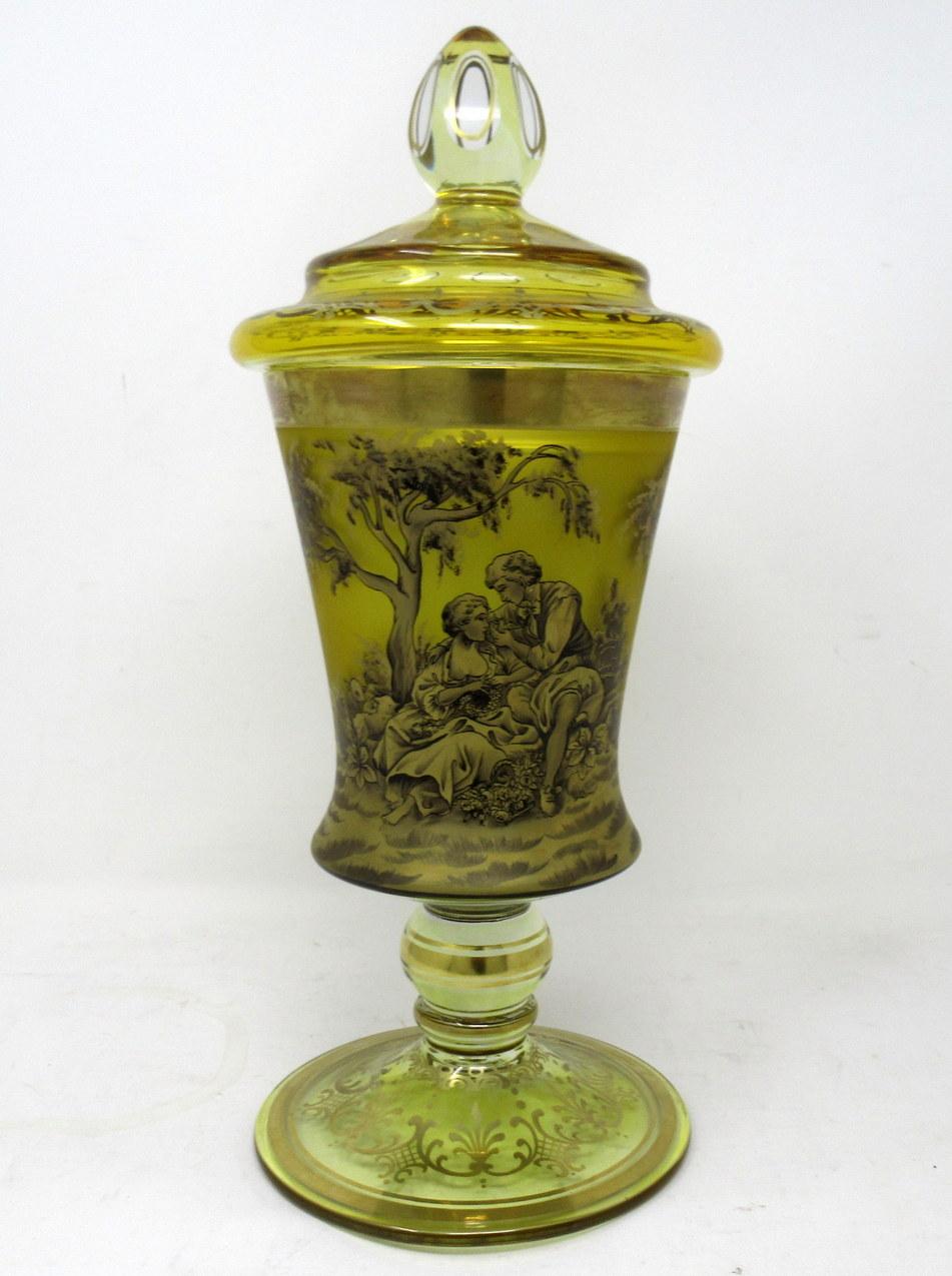 An extremely stylish hand painted bohemian amber-stained lidded goblet of impressive proportions, complete with original firm fitting cover, late Nineteenth Century. 

Of facetted circular outline, the lid with pentagonal finial and engraved with