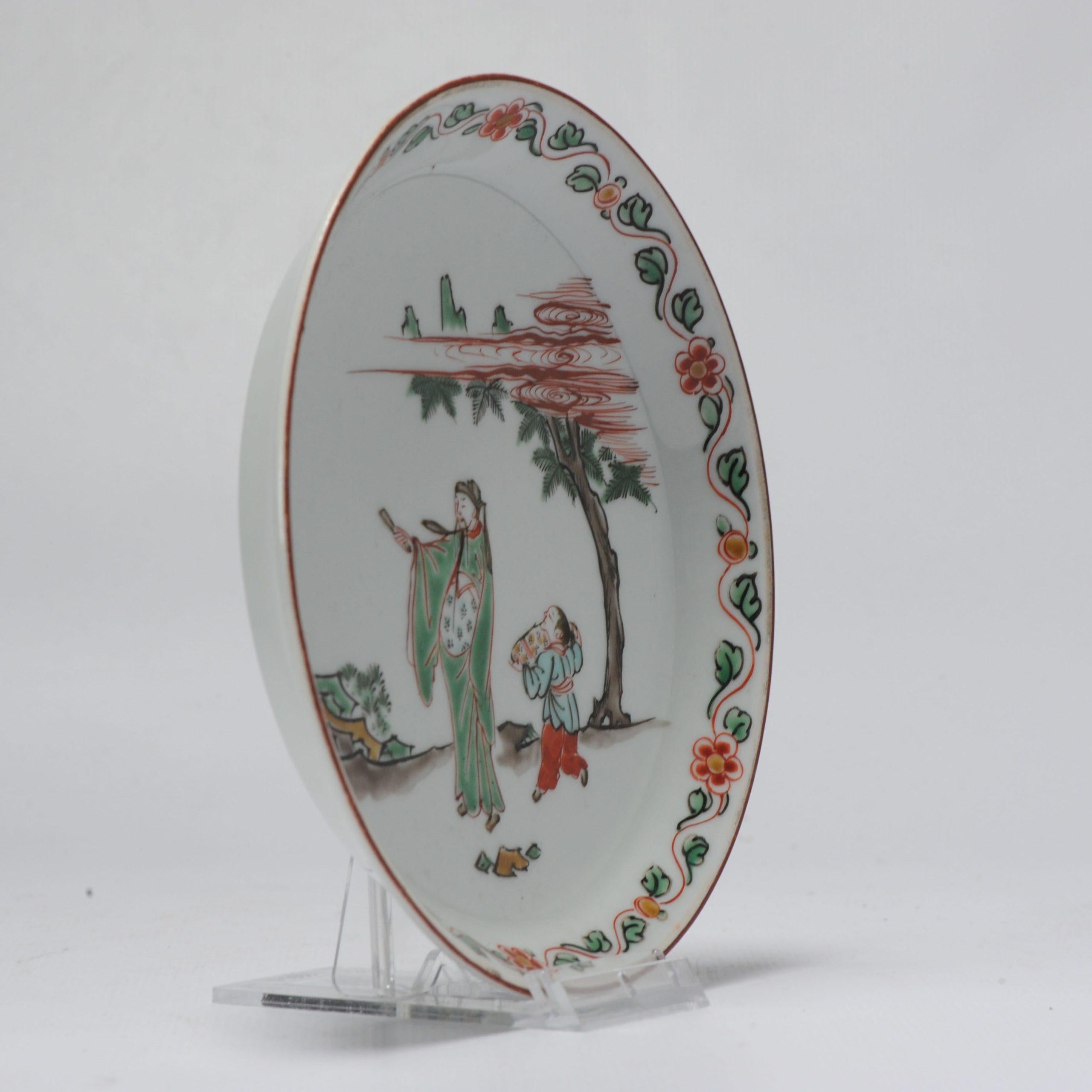 A lovely dish in the style of Ming/Transitional Chinese Ko Akae wares. This is a 1 on 1 copy of the same dish from China from the 17th century. We think this is a 19th century version, but since not sure we put it as 19th/20th.

Central scene of a