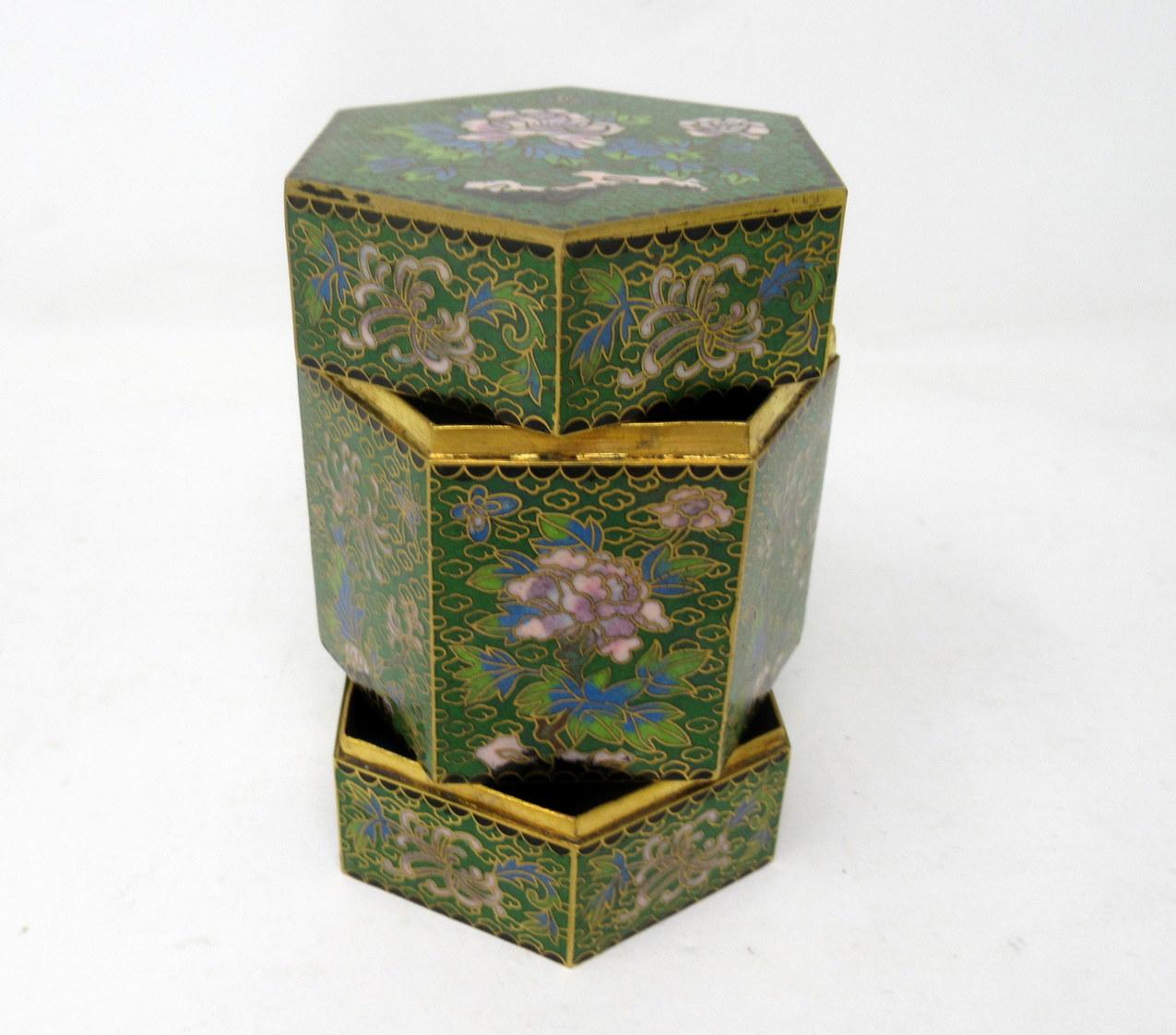 Stylish hand painted Chinese or Japanese cloisonné enamel heavy gauge gilt bronze two section table casket or spice container of hexagonal outline and of exceptional quality. These rare pieces can be difficult to date, circa first half of the 20th