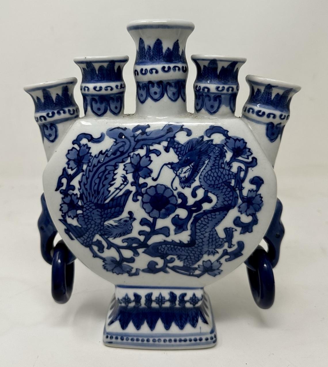 An Impressive Chinese Export “Tulip Flower Bulb Holder” Vase of discodial outline, based on a Dutch Seventeenth Century Shape, possibly early Twentieth Century. 

The superbly decorated bulbous body depicting Dragons and foliage, with five